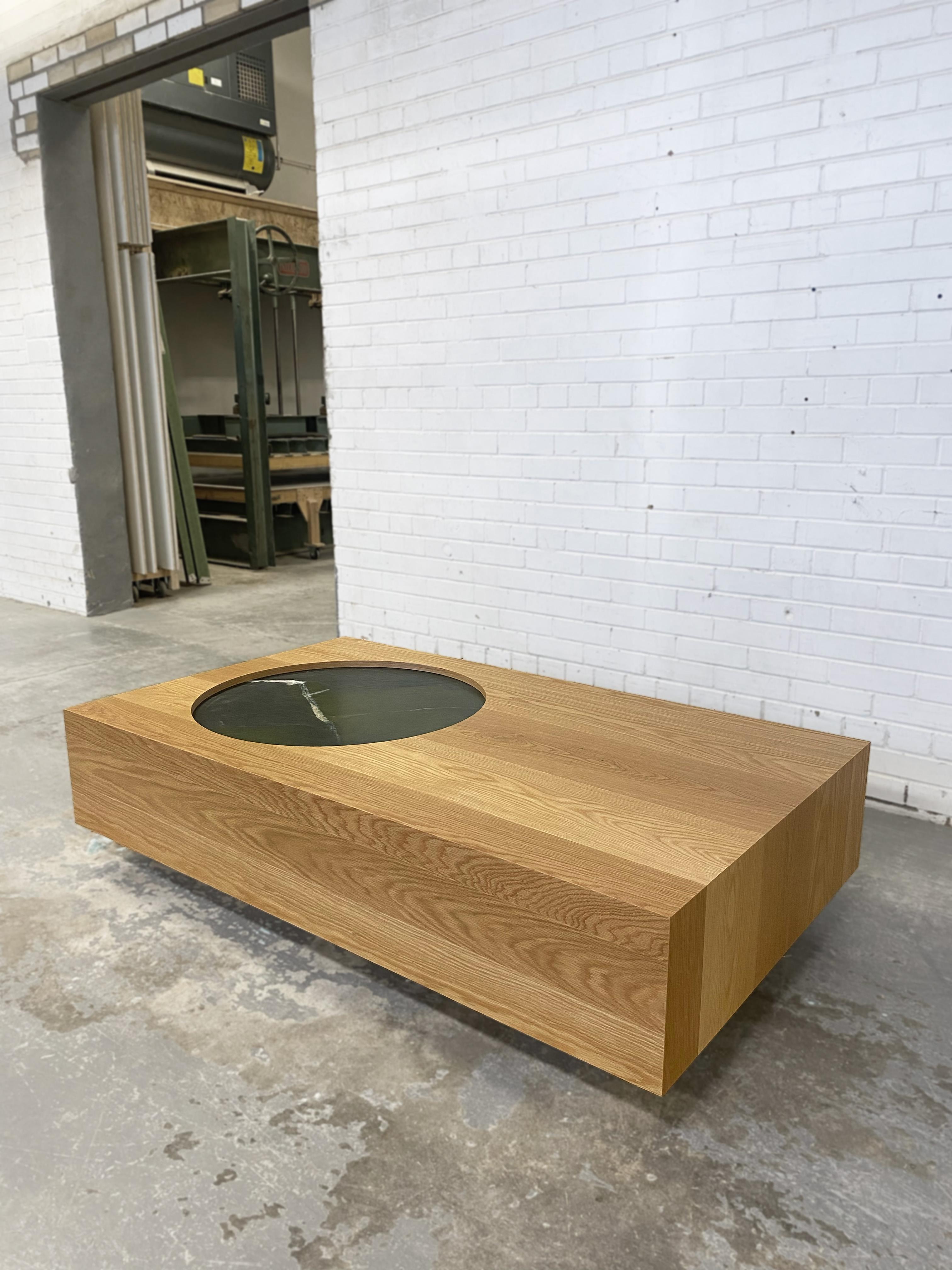 This listing is for our Luna Coffee Table customized with an Avocatus Quartzite integrated tray, available NOW while quantities last (we have one in stock as shown). If custom sizing is required, please inquire within for pricing and availability.