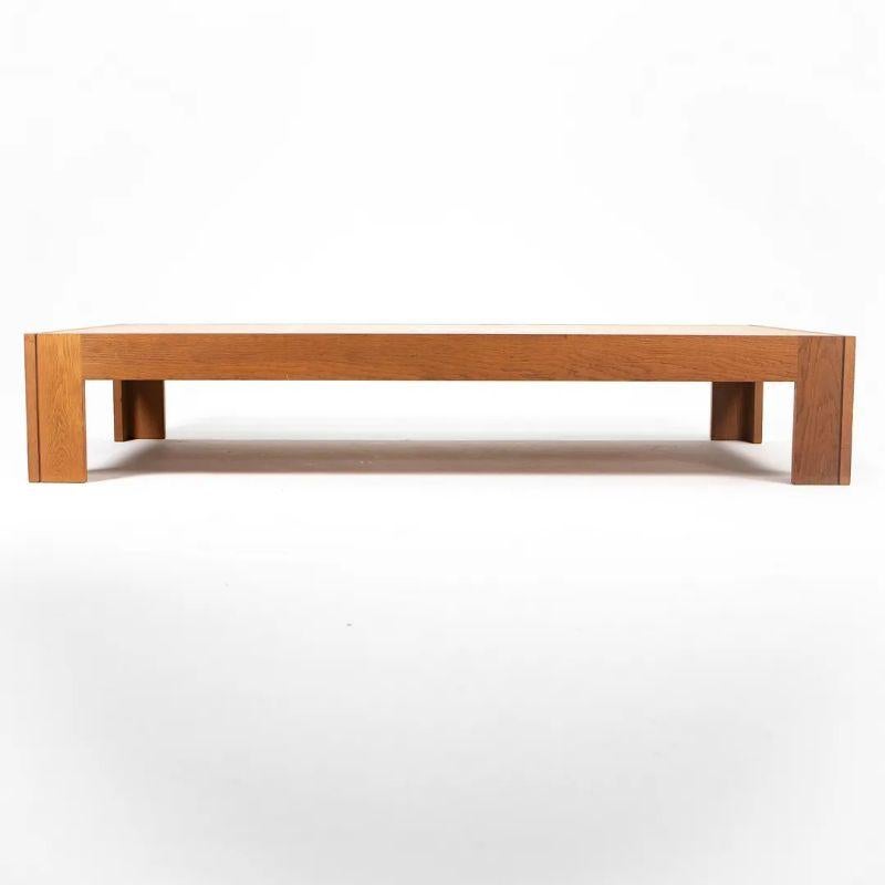 This is a long low rectangular coffee table, executed in chunky quarter sawn white oak. It was designed by Tage Poulsen for C.I. Designs in Boston, Massachusetts, c. 1975. C.I. Designs was a licensed manufacturer of Tage Poulsen designs, as well as