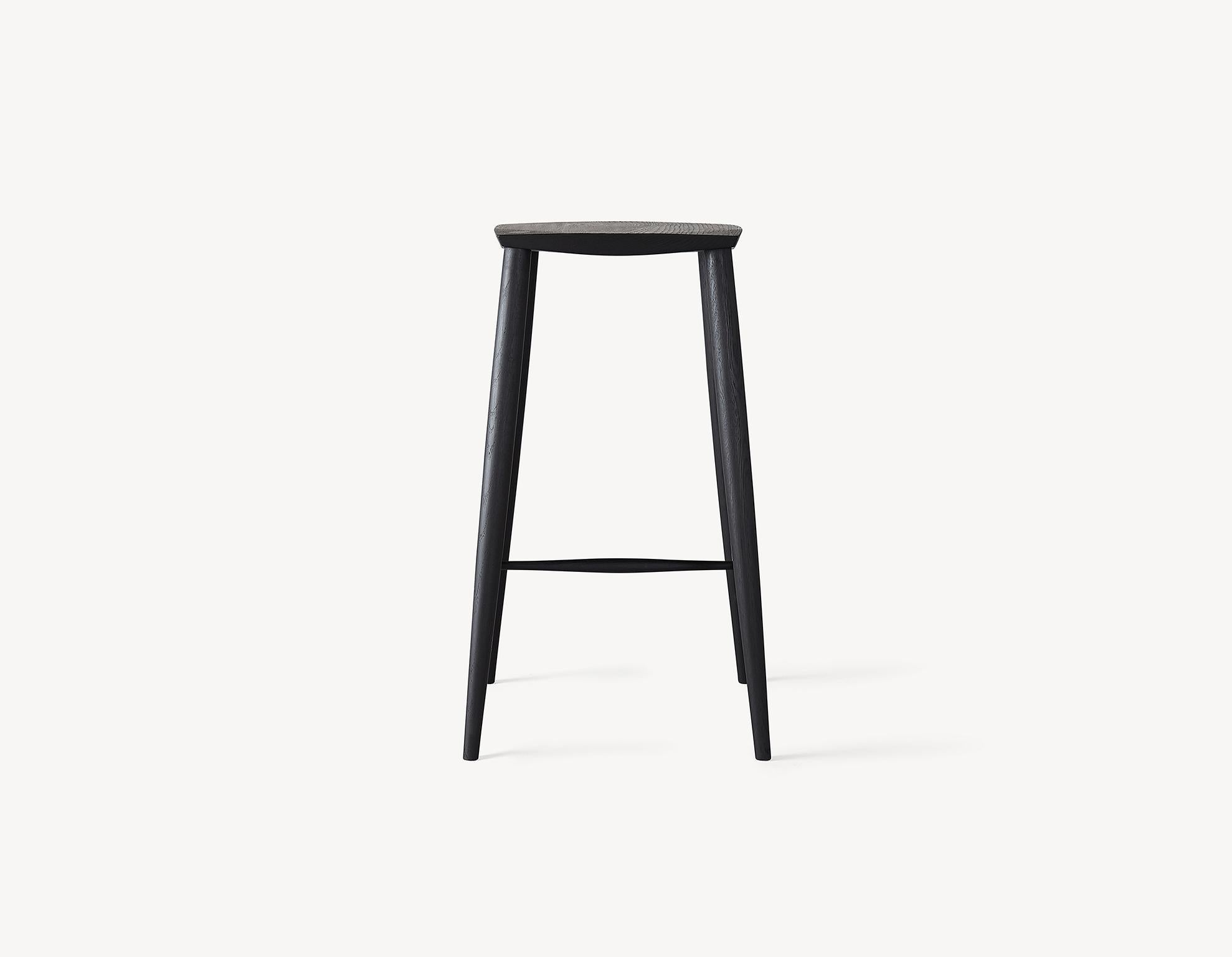 An instant Classic with a contemporary turned legs and a faceted top for comfort, this counter height stool will Stand the test of time and only get better with age. A light and durable stool that features wedged through-tenons as well as pegged