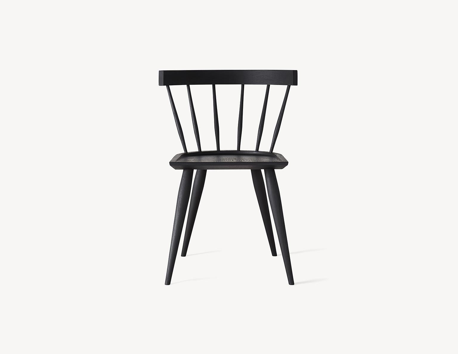 The Edwin chair is a Minimalist take on the Classic Windsor chair, making it a versatile seating option for any space. Made of select white oak with a hand rubbed black or white (no VOC) oil finish. Each chair is handcrafted and features a deep,