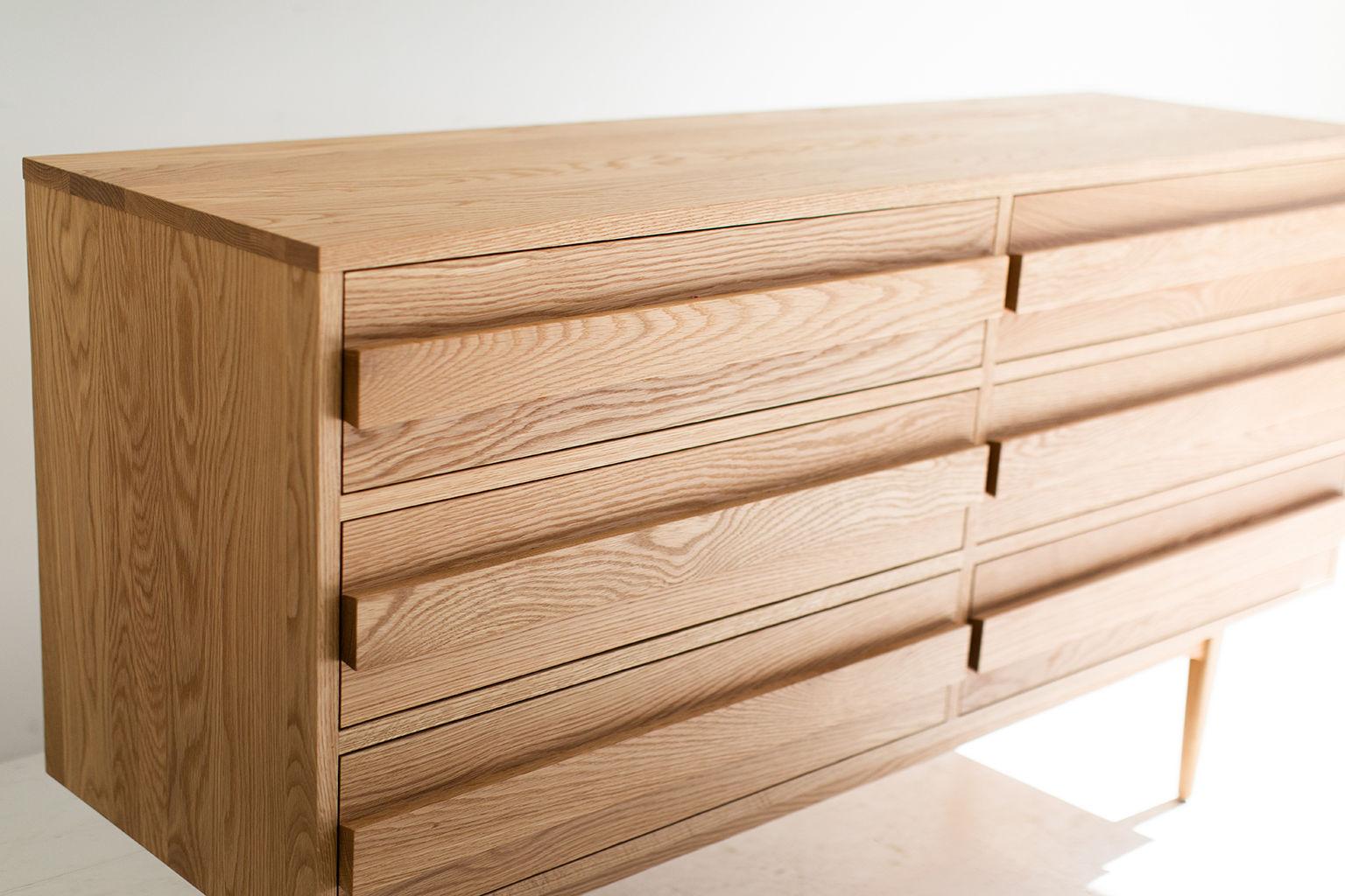 This modern dresser is made in the heart of Ohio with locally sourced wood. Each dresser is hand-made with solid white oak and finished with a beautiful matte commercial grade finish. It is important to us to let the natural beauty of the white oak