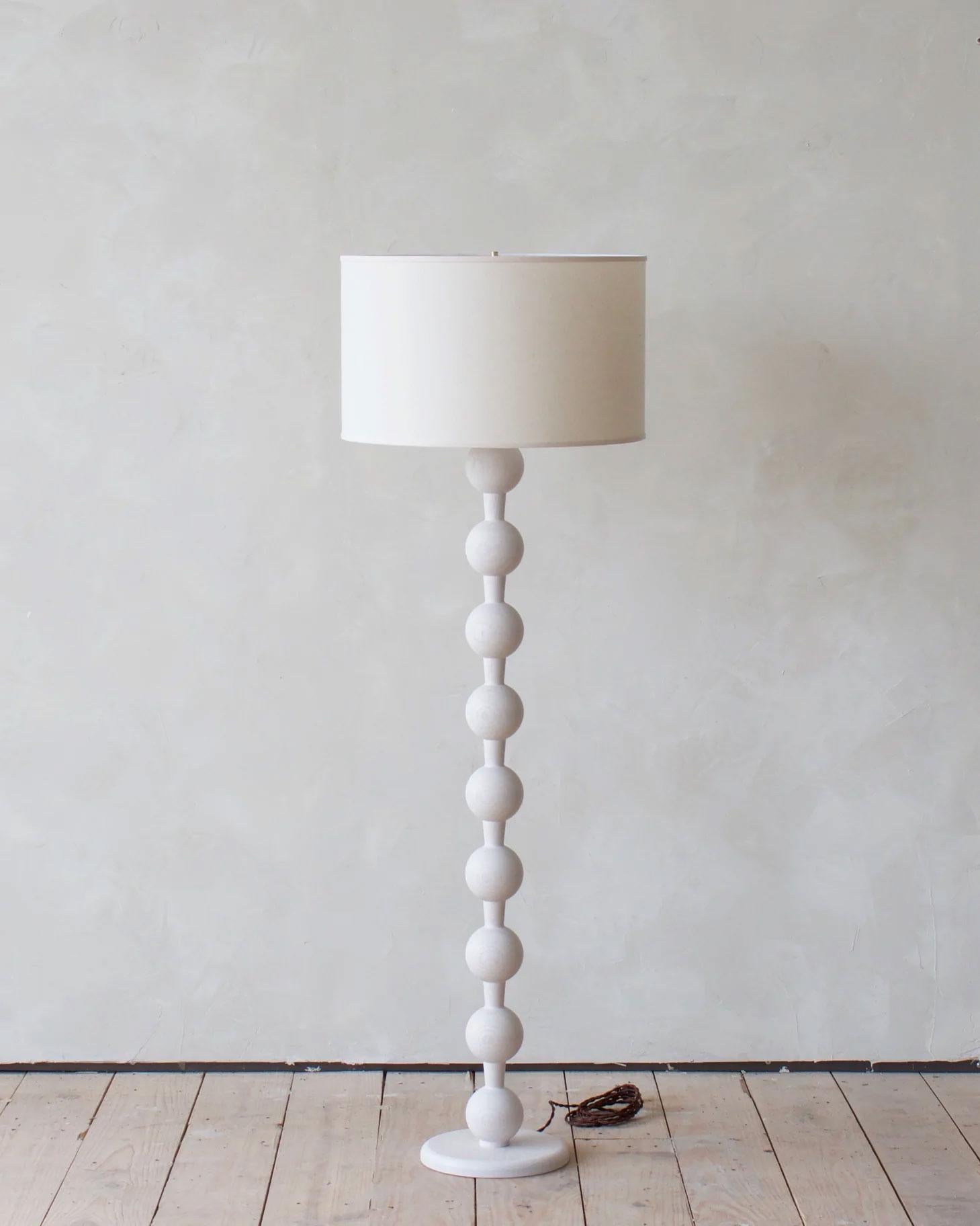 Hand-crafted in Pennsylvania, the solid oak balls create a fixture that is as sturdy as it is stylish. The grained oak texture shows through the finish revealing a rich history unique to each piece. The charming sculptural design of the Hugo Barbell