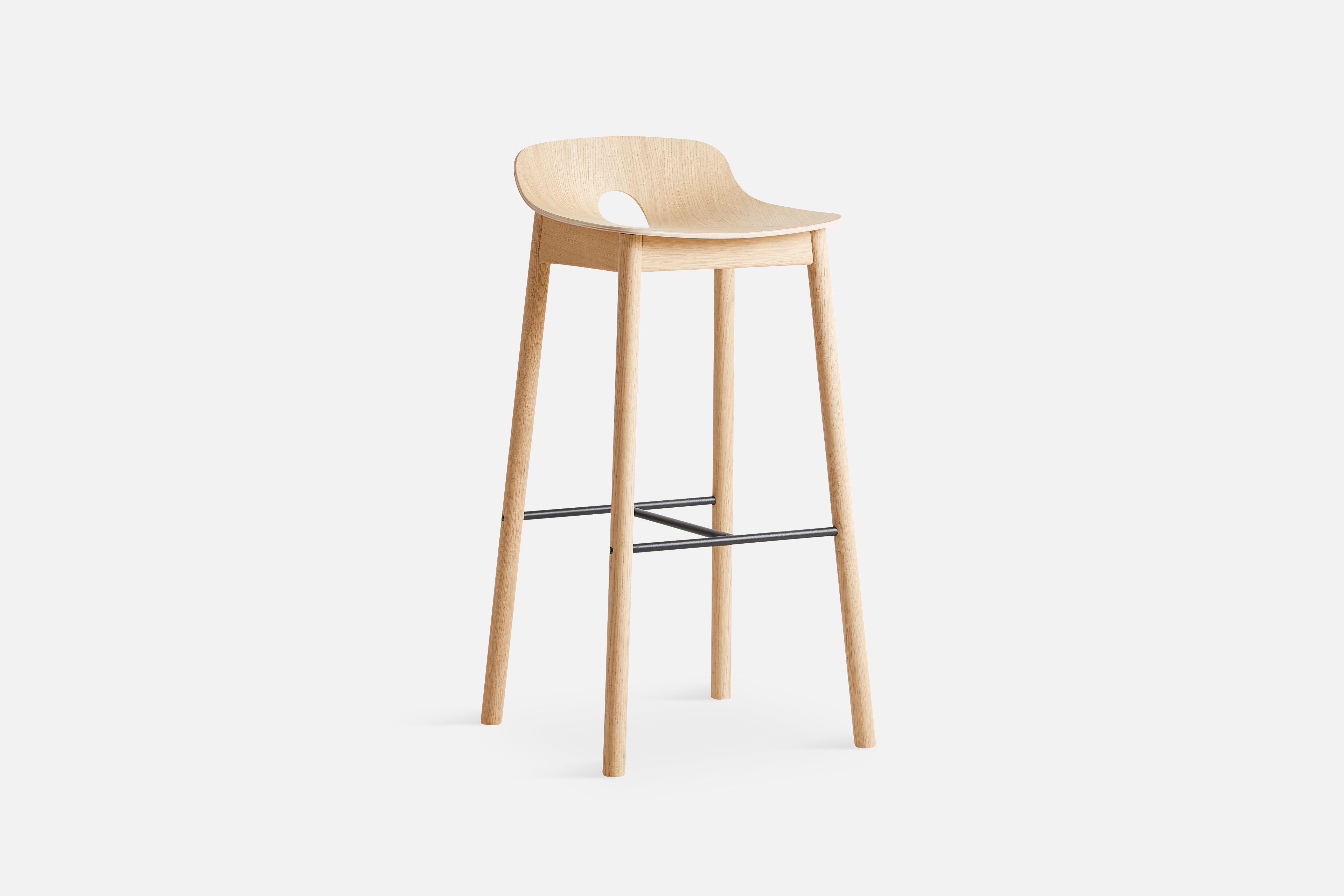 White oak mono bar stool by Kasper Nyman.
Materials: plywood with oak veneer.
Dimensions: D 44.7 x W 43.7 x H 87.6 cm.

The founders, Mia and Torben Koed, decided to put their 30 years of experience into a new project. It was time for a change