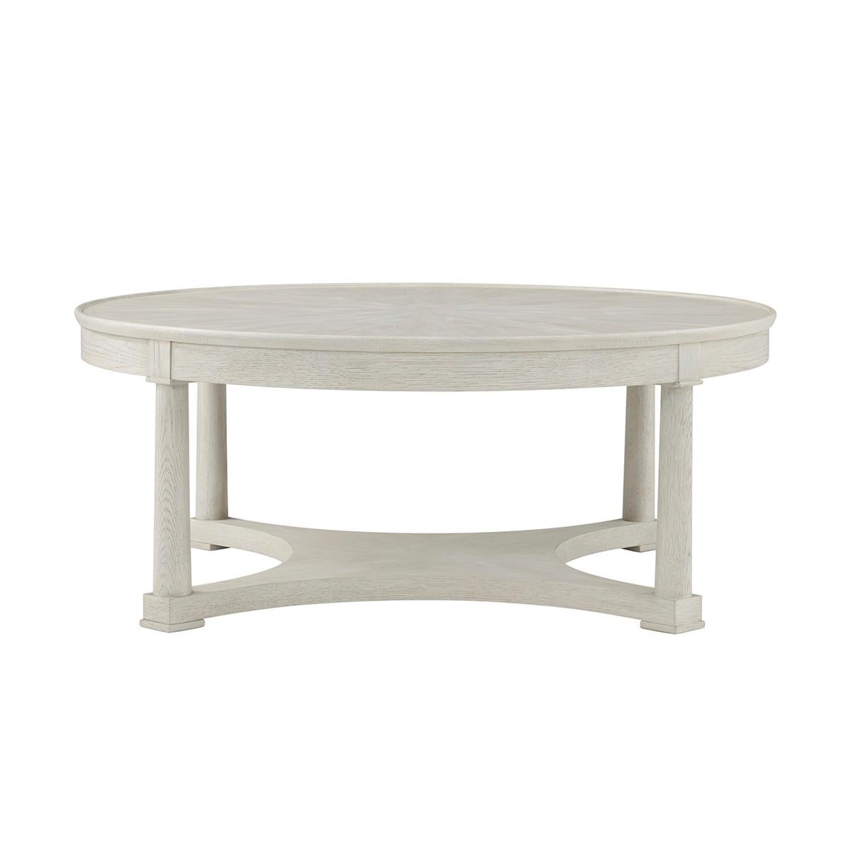 Cette pièce au design élégant allie fonctionnalité et style, ce qui en fait la pièce maîtresse parfaite pour tout salon. Fabriquée en chêne de haute qualité, la table présente une finition lavée blanche qui met en valeur le grain naturel et la