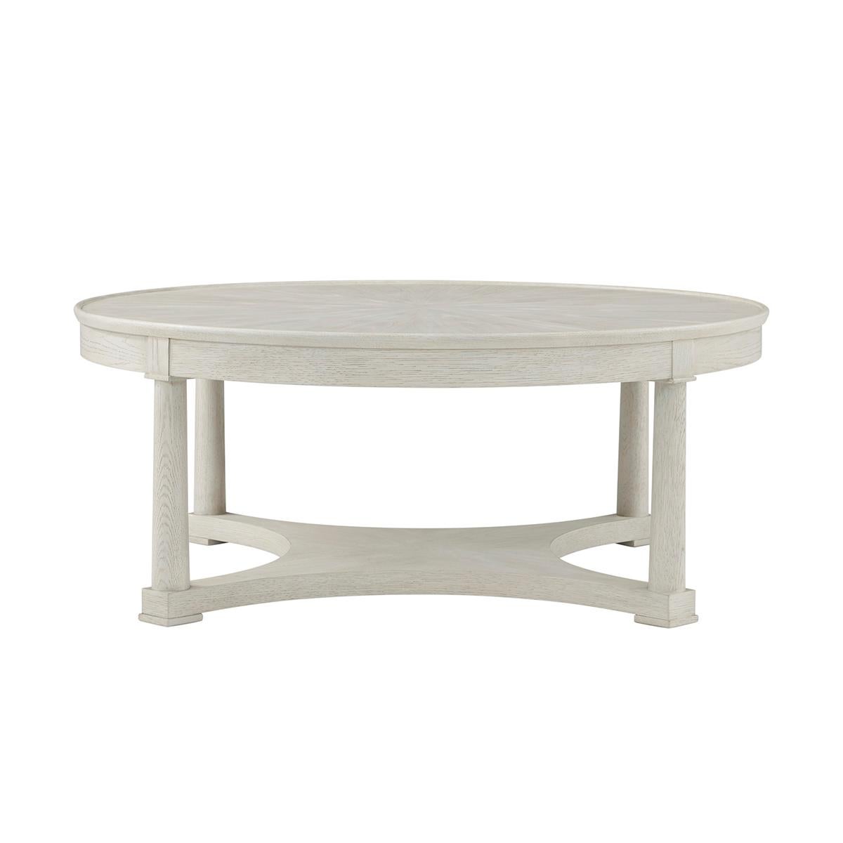 This elegantly designed piece combines functionality with style, making it the perfect centerpiece for any living room. Crafted from high-quality oak, the table white washed finish that highlights the natural grain and texture of the wood, adding