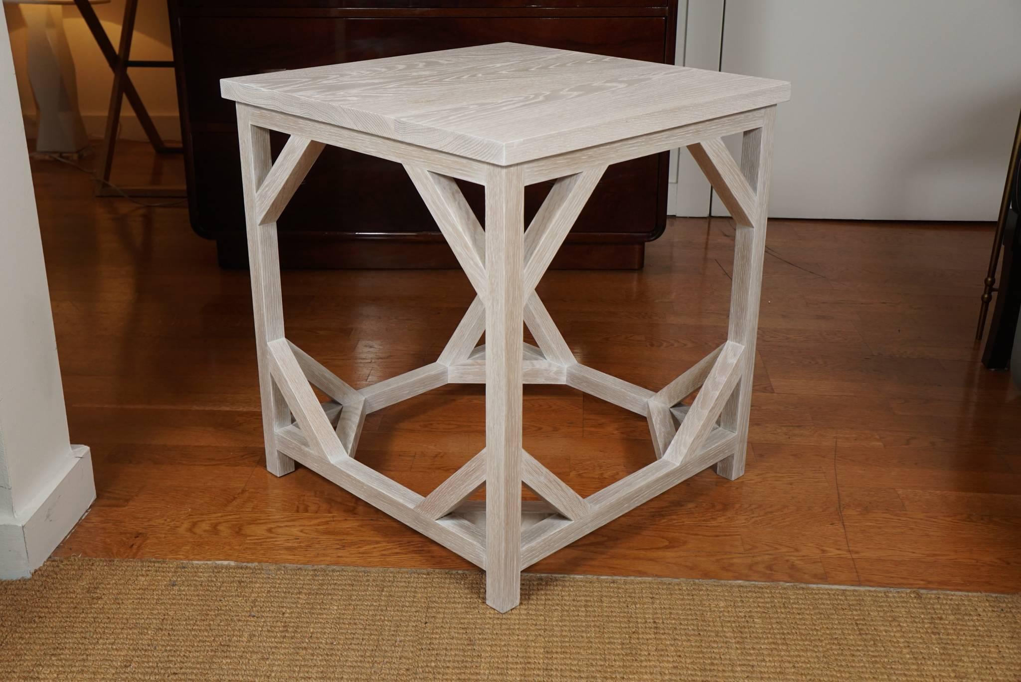 striking, white oak side table, with decorative leg brackets.