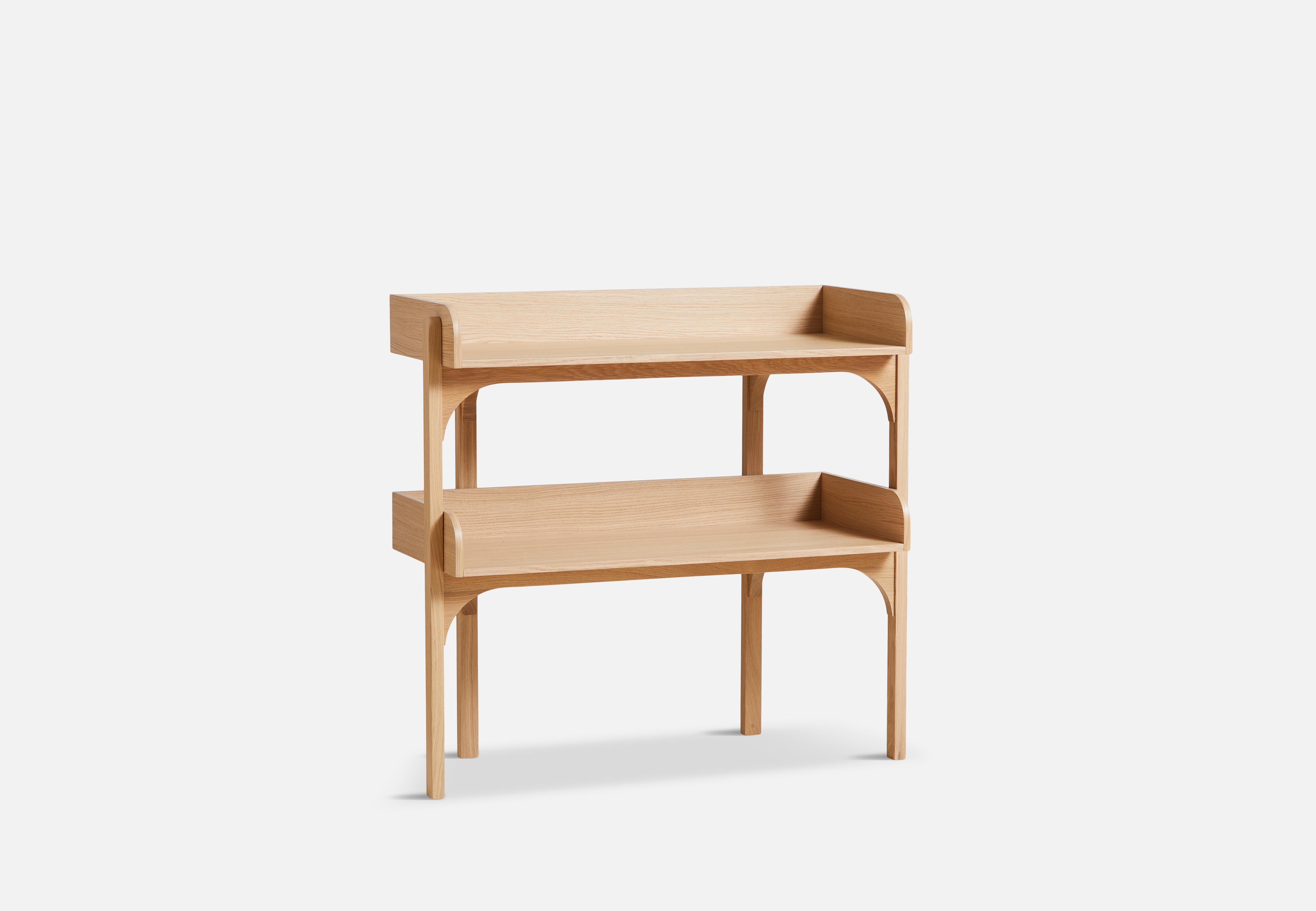 White Oak utility shelf by Rachael Heritage
Materials: Oak
Dimensions: D 63.5 x W 84.5 x H 82.5 cm
Also available in different colors and materials.

The founders, Mia and Torben Koed, decided to put their 30 years of experience into a new