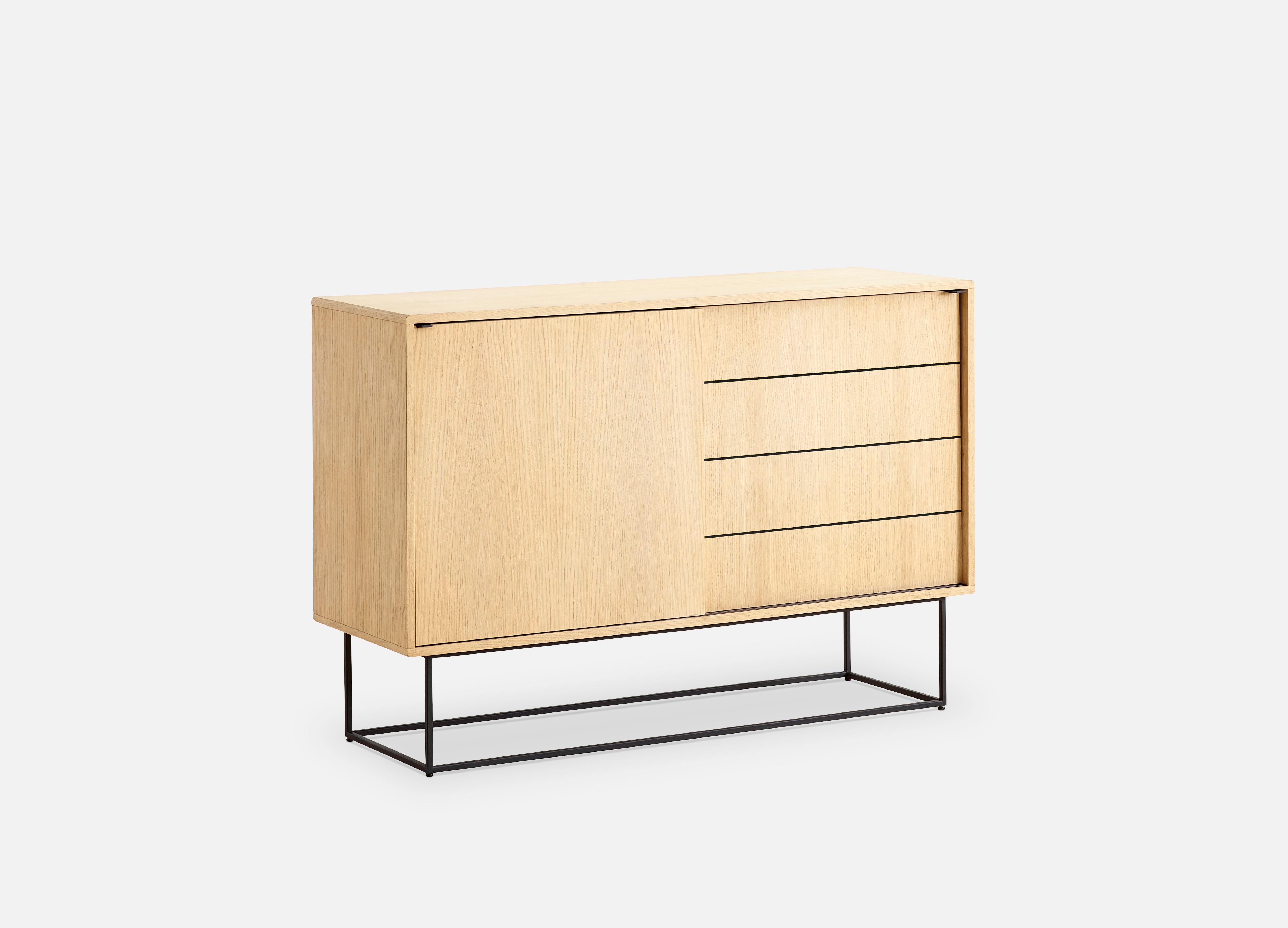 White oak virka high sideboard by Ropke Design and Moaak
Materials: oak, metal.
Dimensions: D 40 x W 120 x H 82 cm
Also available in different colours and materials. 

The founders, Mia and Torben Koed, decided to put their 30 years of