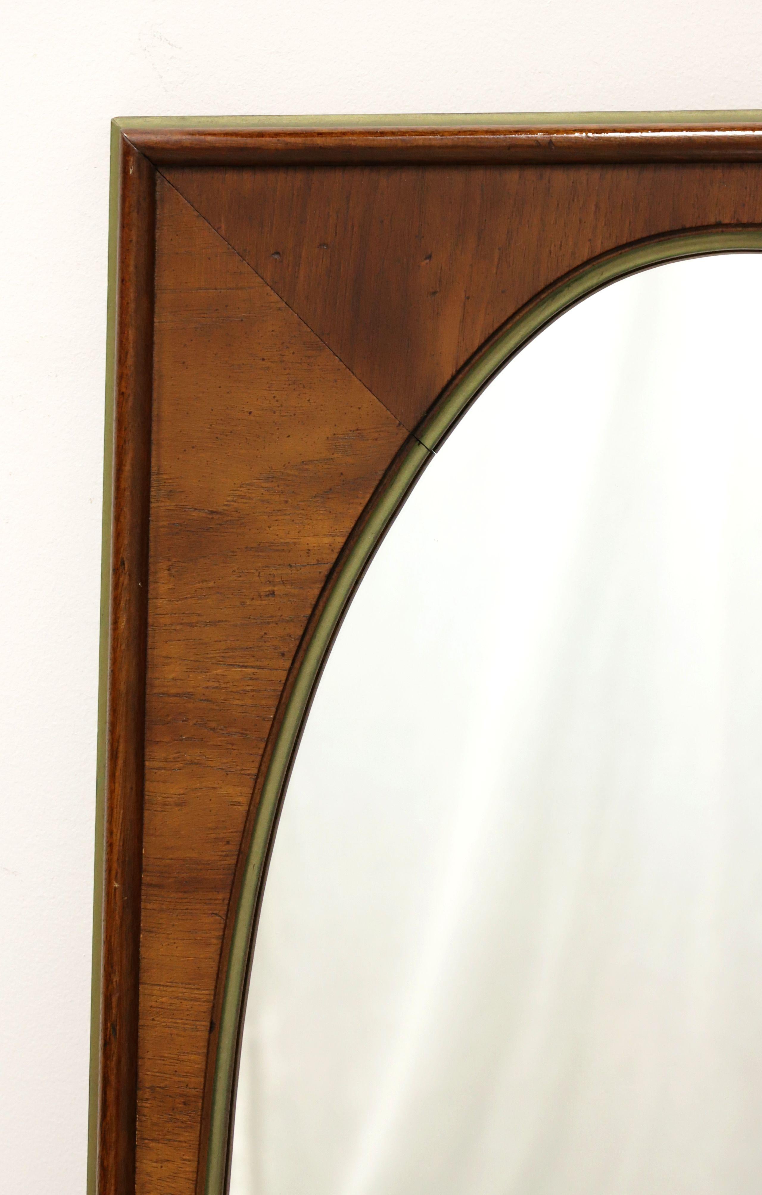 oval mirror in rectangular frame