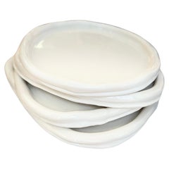set of White on White dinner Plates in porcelain by artist- designer Hania Jneid