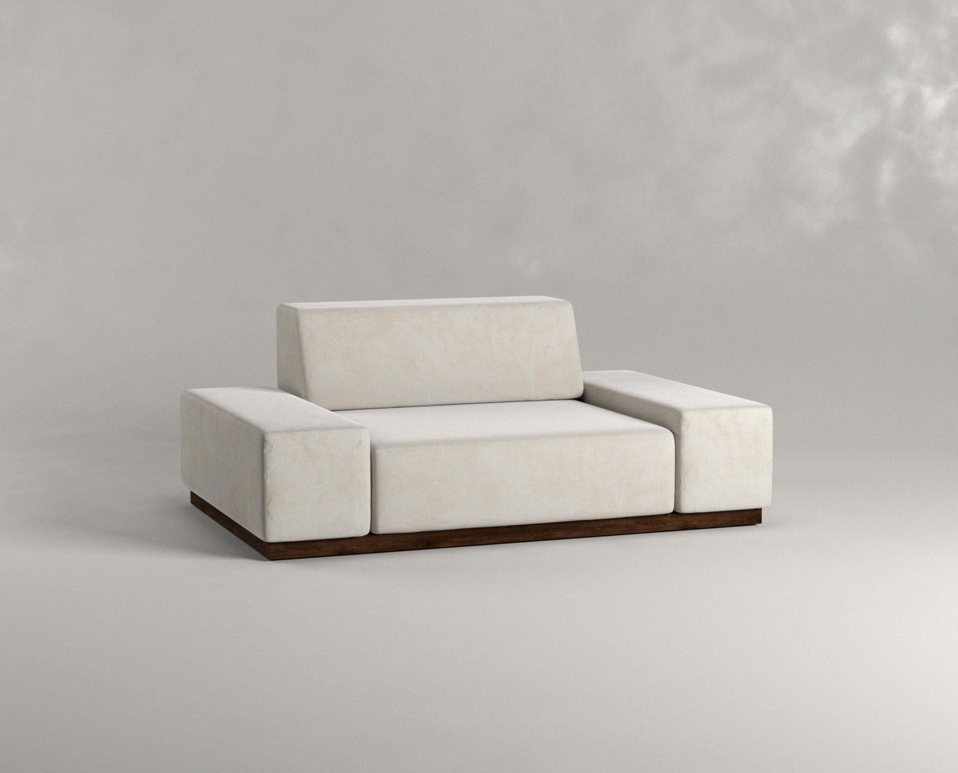 Nube Sofa One Seater White by Siete Studio
Dimensions: D150 x W100 x H60 cm.
Materials: Walnut, cushions, upholstery.

Characterised by its round edges and soft white cushions, Nube carries the comforting sensation of falling into a cloud.
The