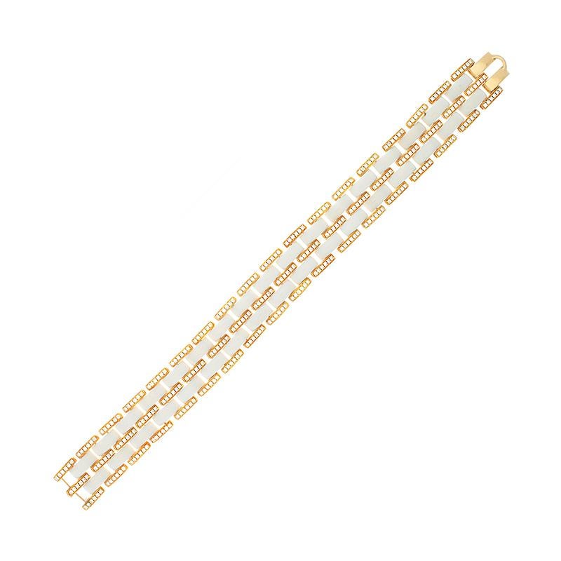 This absolutely unique bracelet features clean white onyx segments with 3.86 carats of VS quality round cut diamonds set in 18K yellow gold.  The contrast between the white onyx and rose gold makes the bracelet pop.  This is a fantastic bracelet to