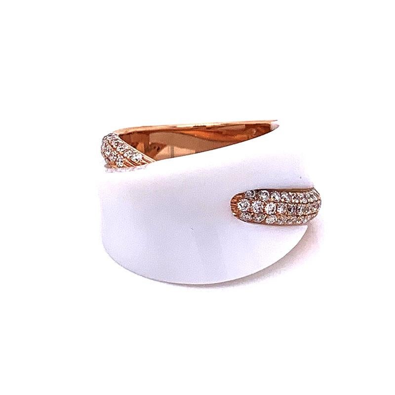 A smooth piece of white onyx sparkles on top of this modern styled ring. It is accented with 0.57 carats of round brilliant cut diamonds set in 18k rose gold. A fashionable piece that can compliment any outfit, day or night. 


Ring Size 5.75