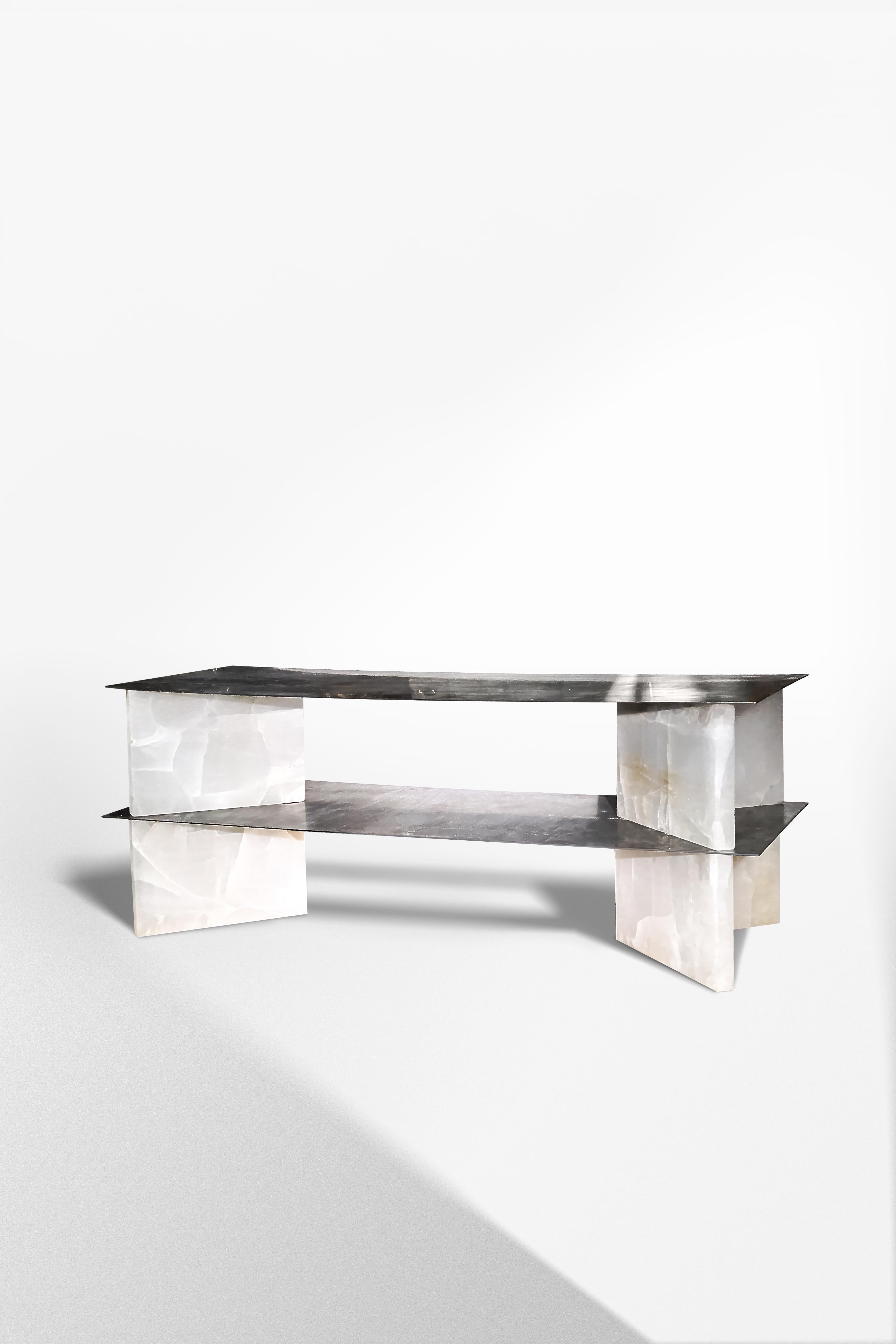 White Onyx Low Console by Studiopepe
Limited Edition Of 8 Pieces.
Dimensions: D 59 x W 153 x H 53 cm.
Materials: White onyx and stainless steel.

Multifaceted design agency Studiopepe was founded in Milan in 2006. Eclectic, voguish, it is the