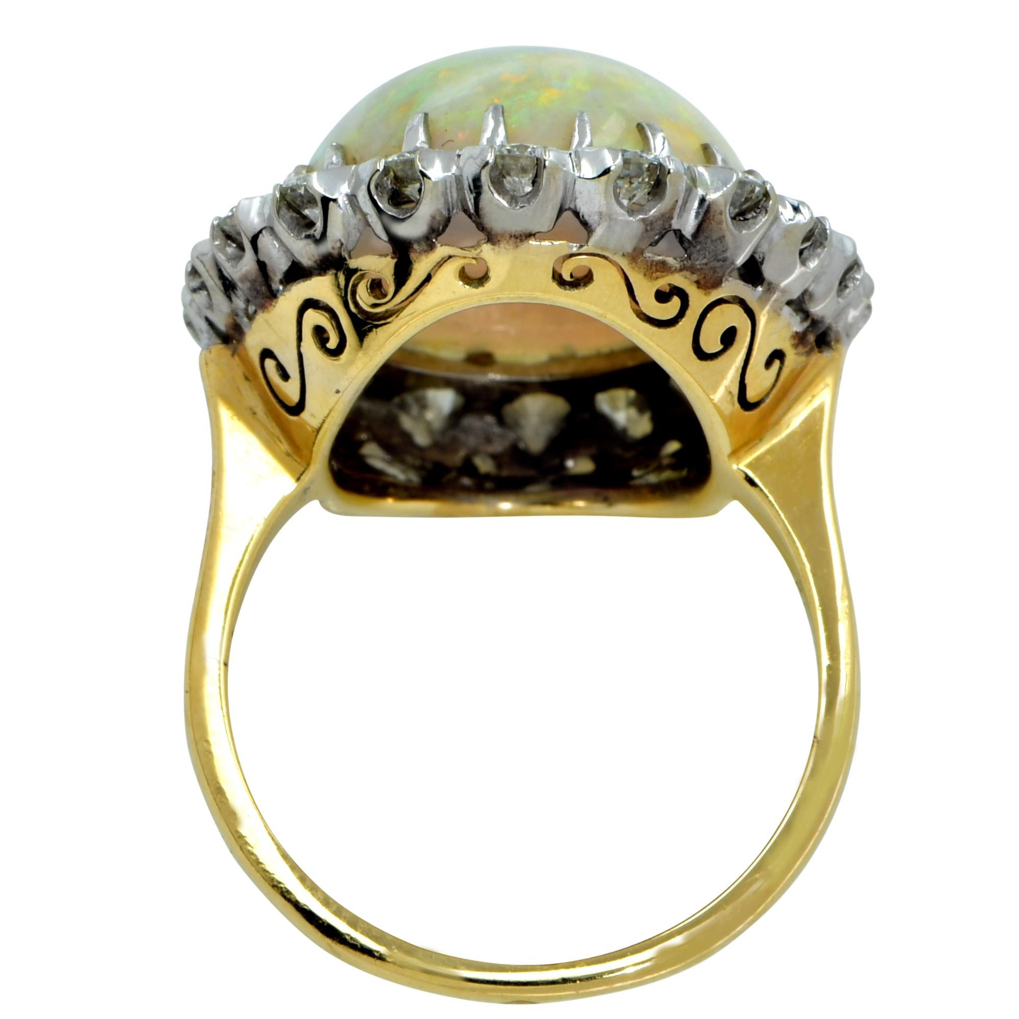 Modern White Opal Cabochon and Diamond Halo Ring