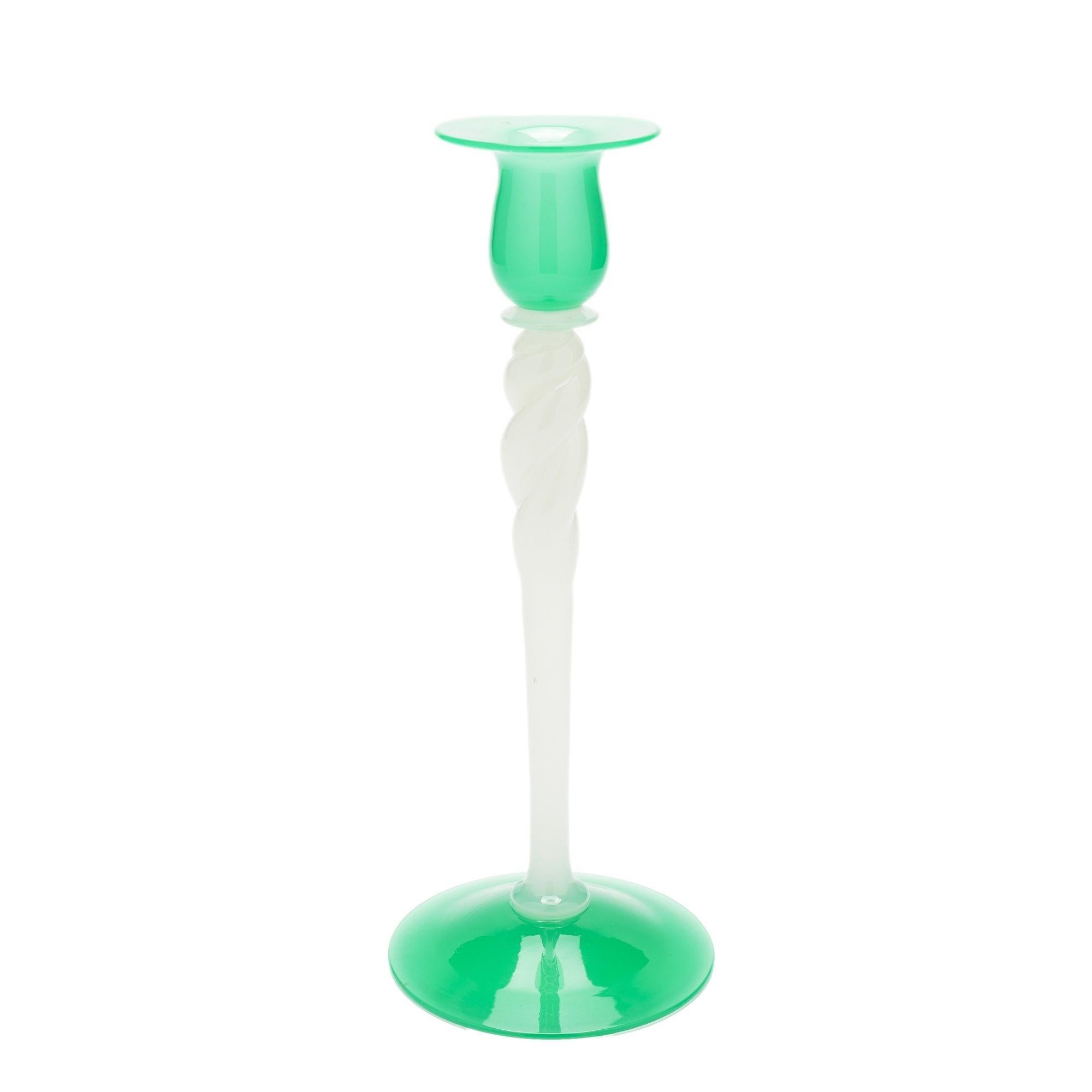 Blown glass Steuben candlestick with jade green circular foot and flared rim candle cup on a white opaline twisting rope shaft. Work is unsigned.
American, circa 1925.