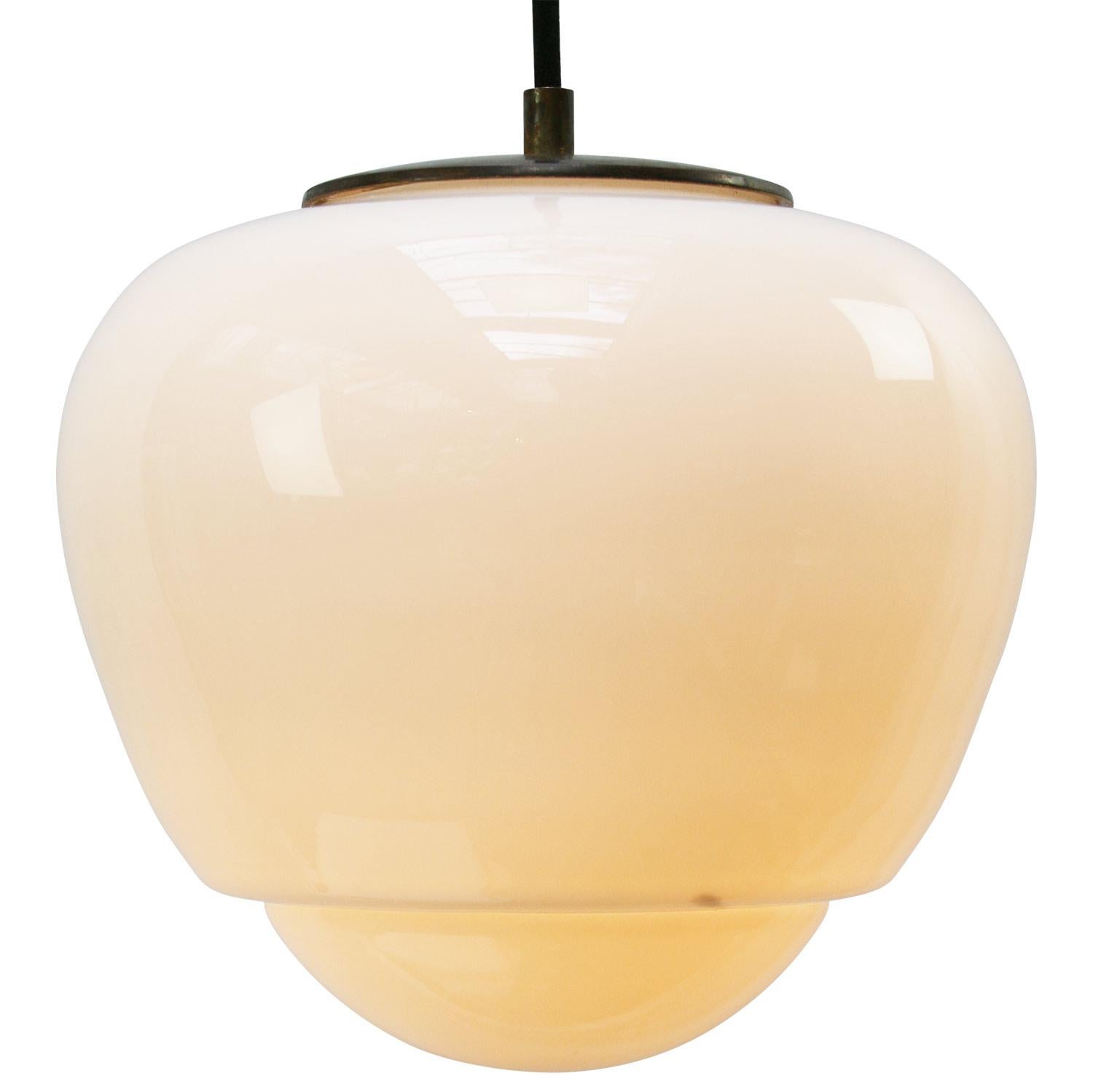 Opaline glass pendant.
2 meter Black wire

Weight: 2.00 kg / 4.4 lb

Priced per individual item. All lamps have been made suitable by international standards for incandescent light bulbs, energy-efficient and LED bulbs. E26/E27 bulb holders and