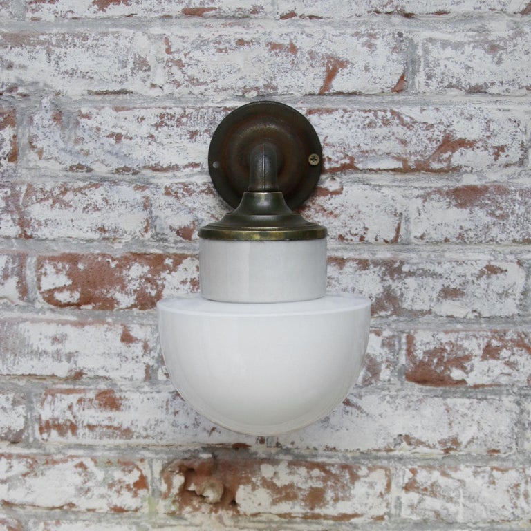 20th Century White Opaline Glass Brass Vintage Cast Iron Arm Scones Wall Lights For Sale