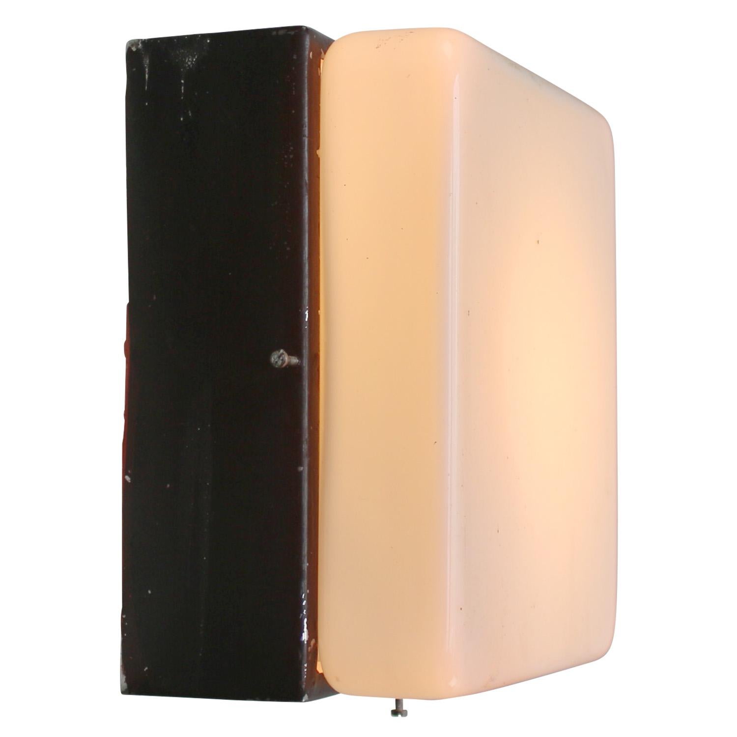 Opaline Industrial scone / ceiling lamp.
Black / dark brown metal base with white opaline glass

Weight: 2.00 kg / 4.4 lb

Priced per individual item. All lamps have been made suitable by international standards for incandescent light bulbs,