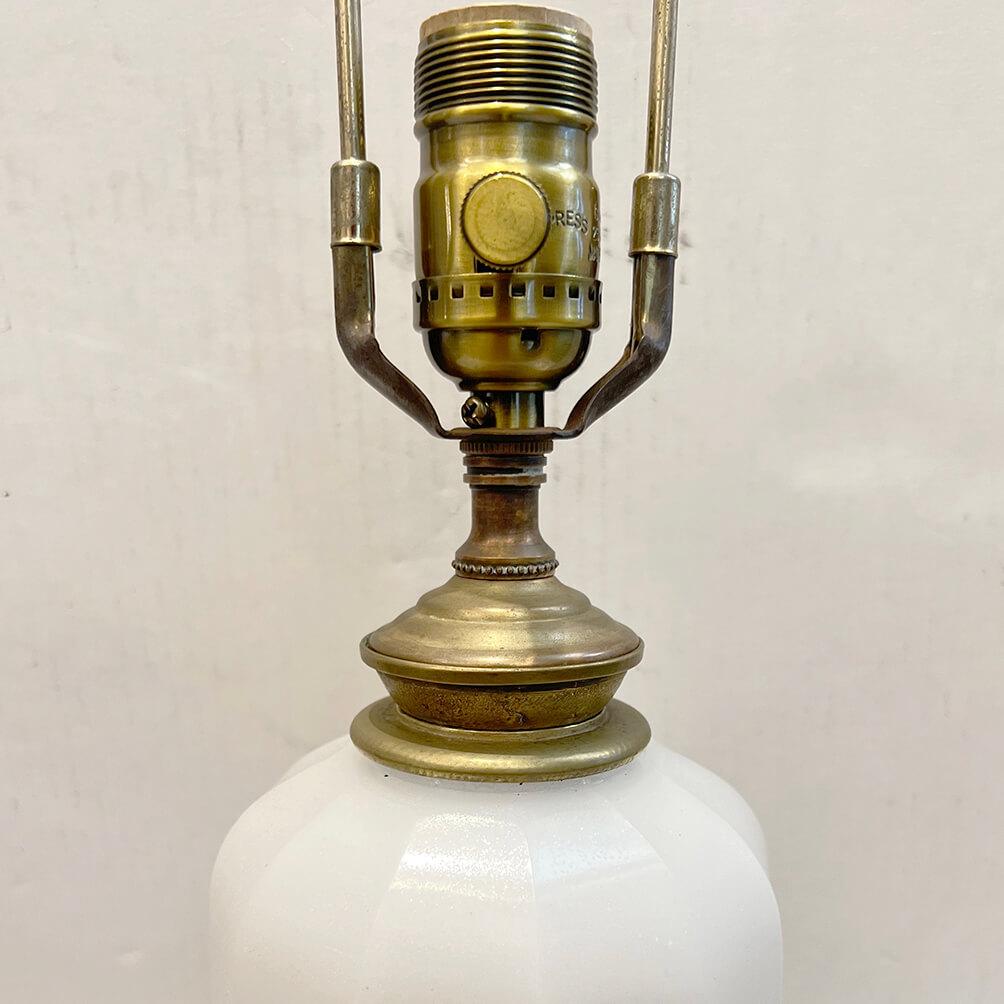 A single circa 1920's French opaline glass table lamp.

Measurements:
Height of body: 16.75