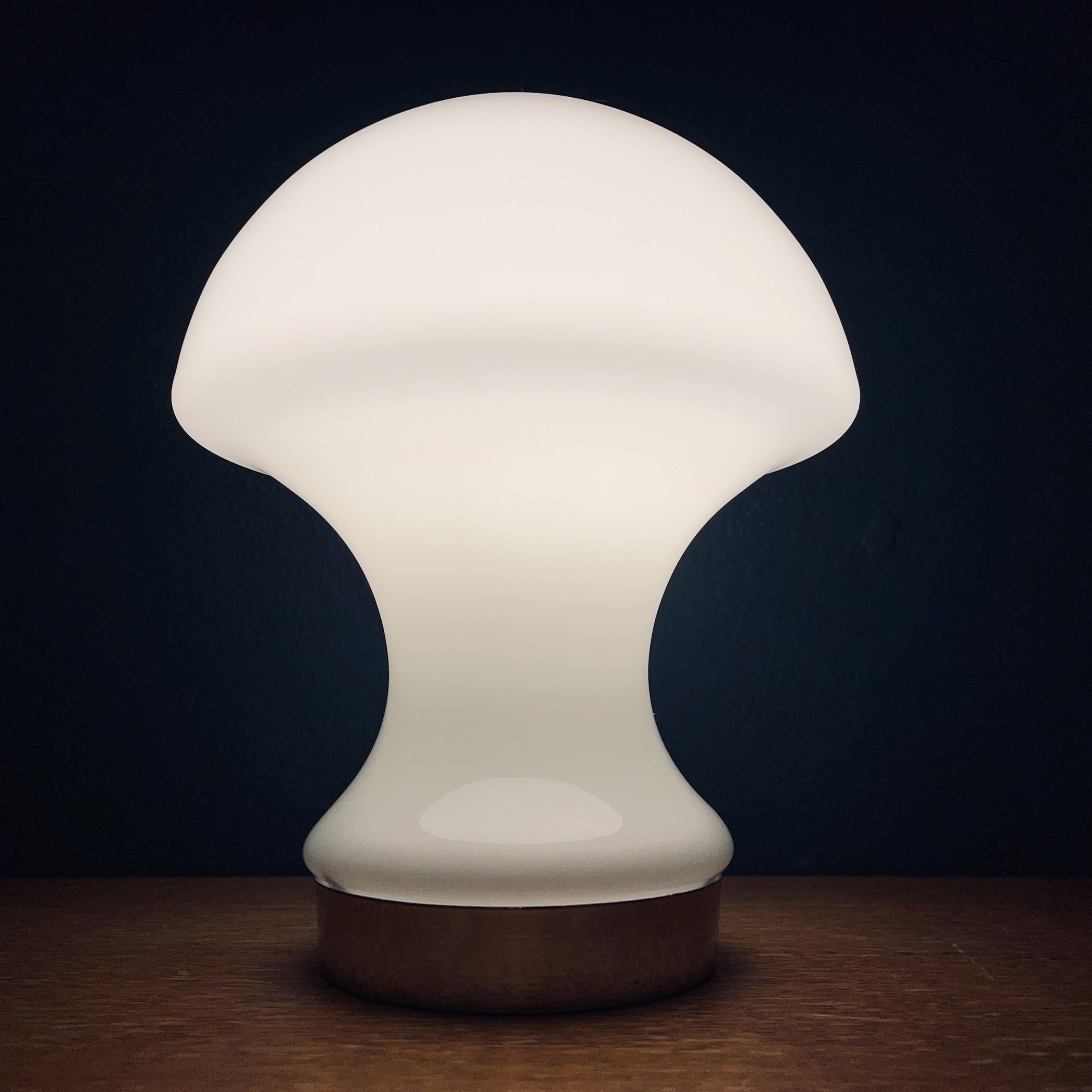 Vintage white mushroom table lamp was made in Italy in the 1980s.
Retro lamp will bring to your home the atmosphere of 70s Italy, the era of the space age. A mid-century table lamp will look great in an Art Deco or Mid-Century Modern