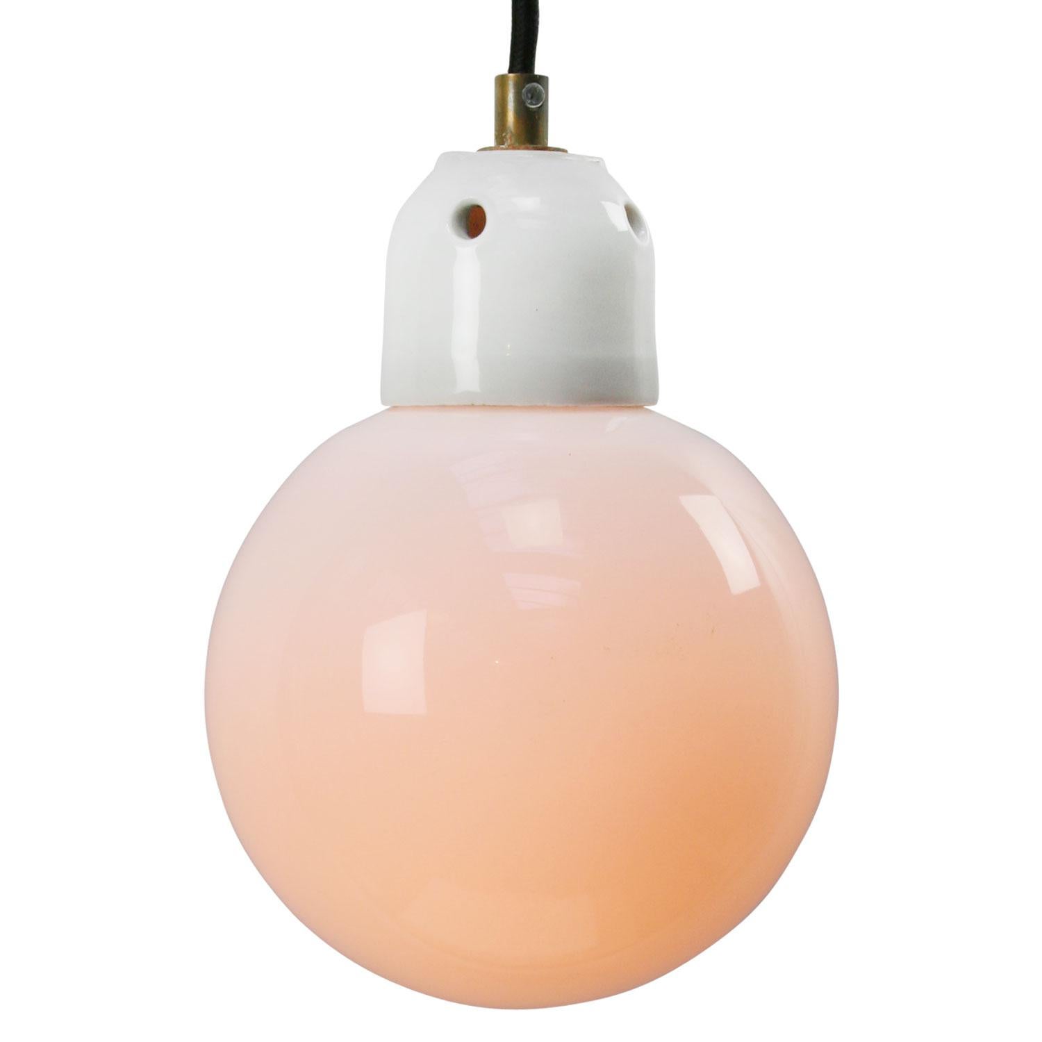 Opaline glass pendant.
2 meter black wire
Porcelain top with brass strain relief

Weight: 0.90 kg / 2 lb

E14 bulb holder. Priced per individual item. All lamps have been made suitable by international standards for incandescent light bulbs,