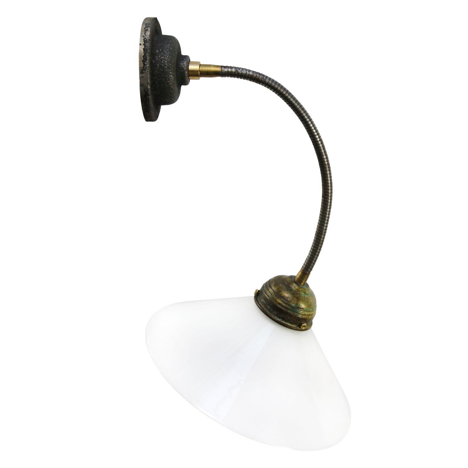 Wall light spot down lighter
White opaline glass.

Gooseneck arm adjustable in angle.

Diameter cast iron wall mount 10.5 cm / 4”
Weight: 1.50 kg / 3.3 lb

Priced per individual item. All lamps have been made suitable by international standards for