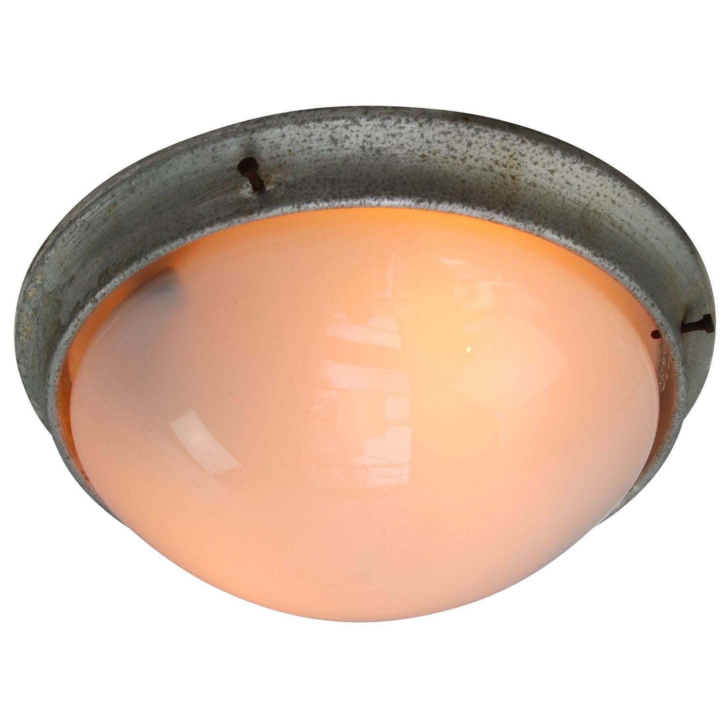 Industrial ceiling and wall lamp. Aluminum base with white Opaline glass.

Weight: 0.50 kg / 1.1 lb

All lamps have been made suitable by international standards for incandescent light bulbs, energy-efficient and LED bulbs. E26/E27 bulb holders