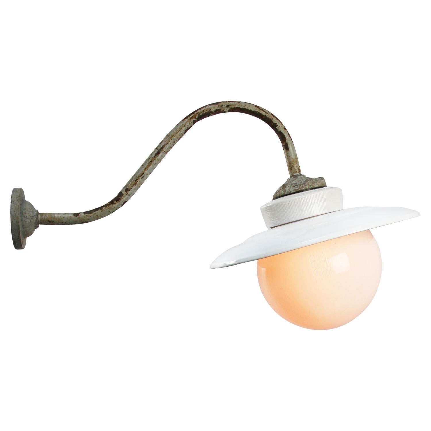 White enamel industrial wall light with white interior.
Cast iron and porcelain top, opaline glass.
Diameter cast iron wall mount: 9 cm, 3 holes to secure.

Weight: 2.10 kg / 4.6 lb

Priced per individual item. All lamps have been made