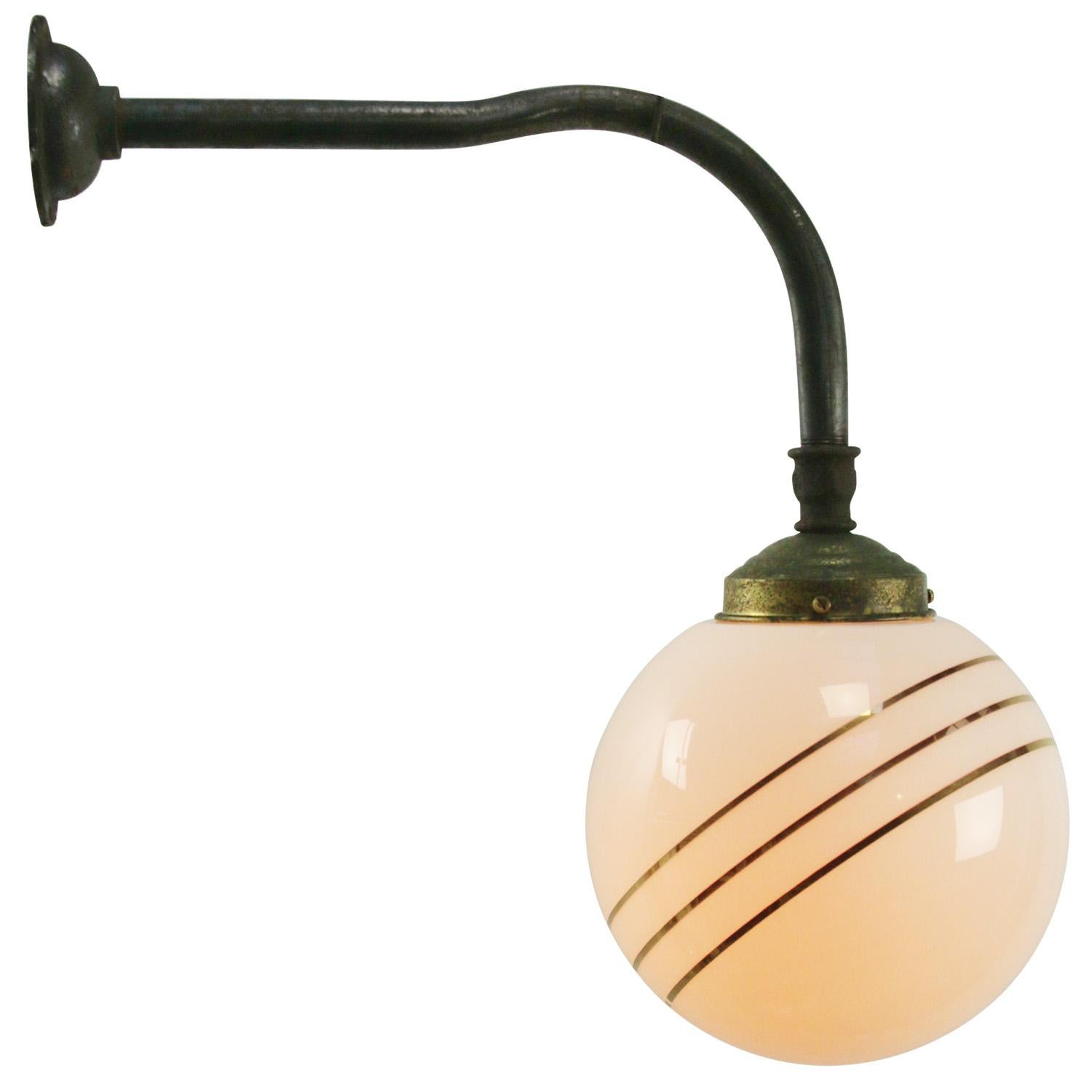 Opaline glass, brass and iron industrial wall light
white opaline glass with 3 golden stripes.

Diameter cast iron wall piece: 8 cm, 3 holes to secure

Weight: 1.20 kg / 2.6 lb

Priced per individual item. All lamps have been made suitable by