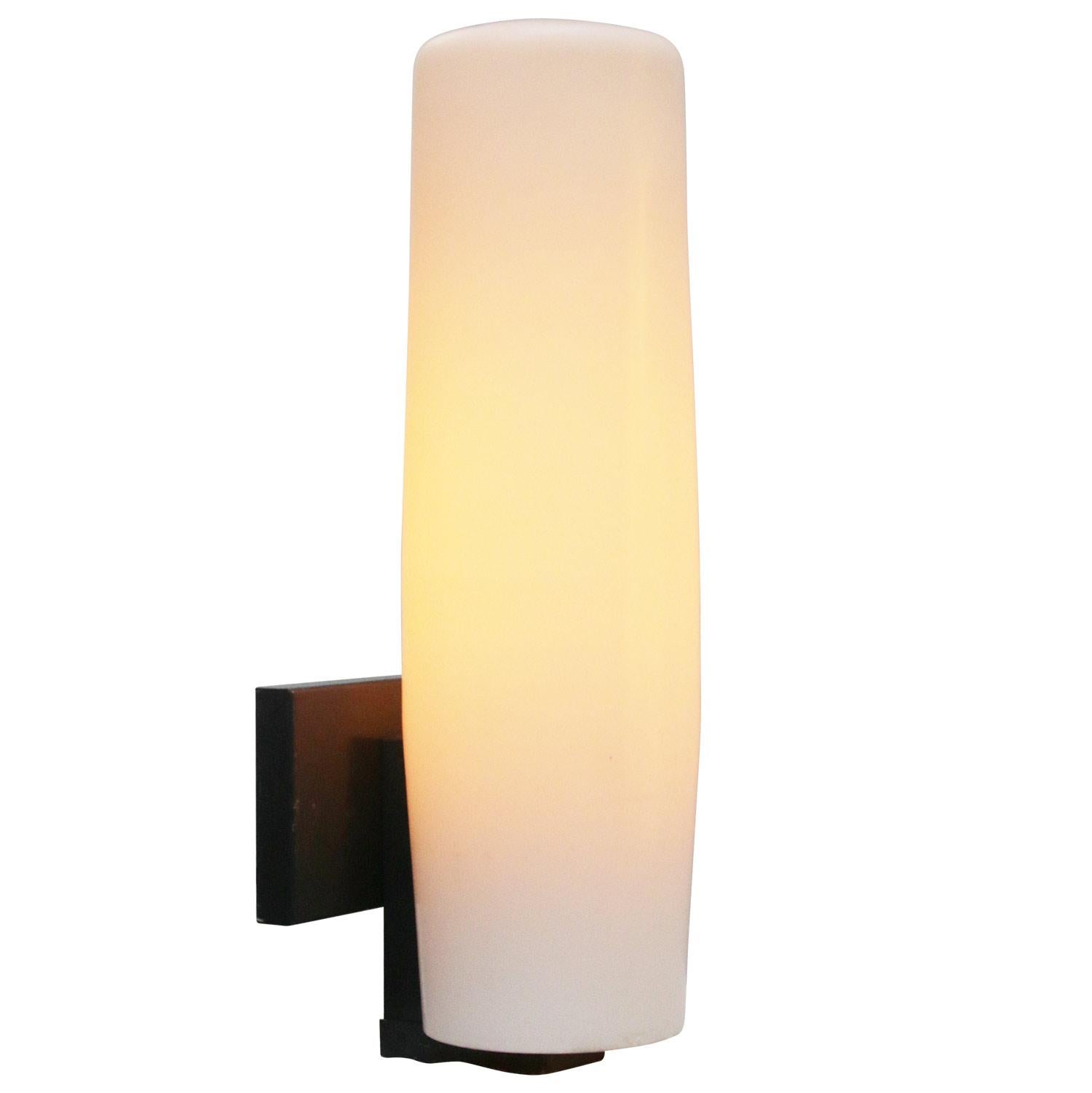Metal and opaline glass wall lamp.
Used in a Dutch monastery

wall plate 13 × 8 cm

for use inside only

Weight: 1.20 kg / 2.6 lb

Priced per individual item. All lamps have been made suitable by international standards for incandescent