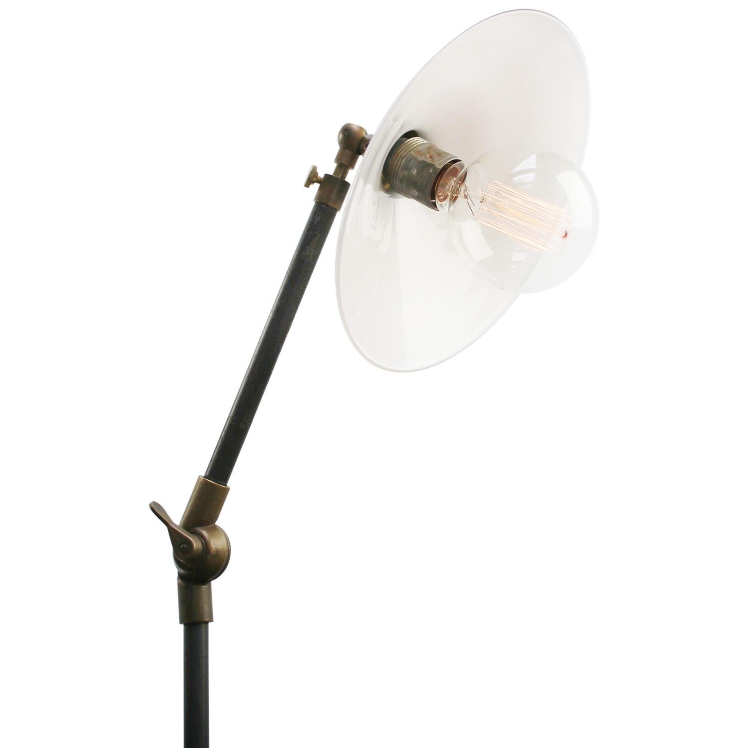 White opaline vintage floor lamp
Cast iron with brass joints
Adjustable in angle. 

Diameter foot 23 cm

Electric wire 2 meter / 80” with plug and floor switch

Available with UK / US plug

Priced per individual item. All lamps have been made