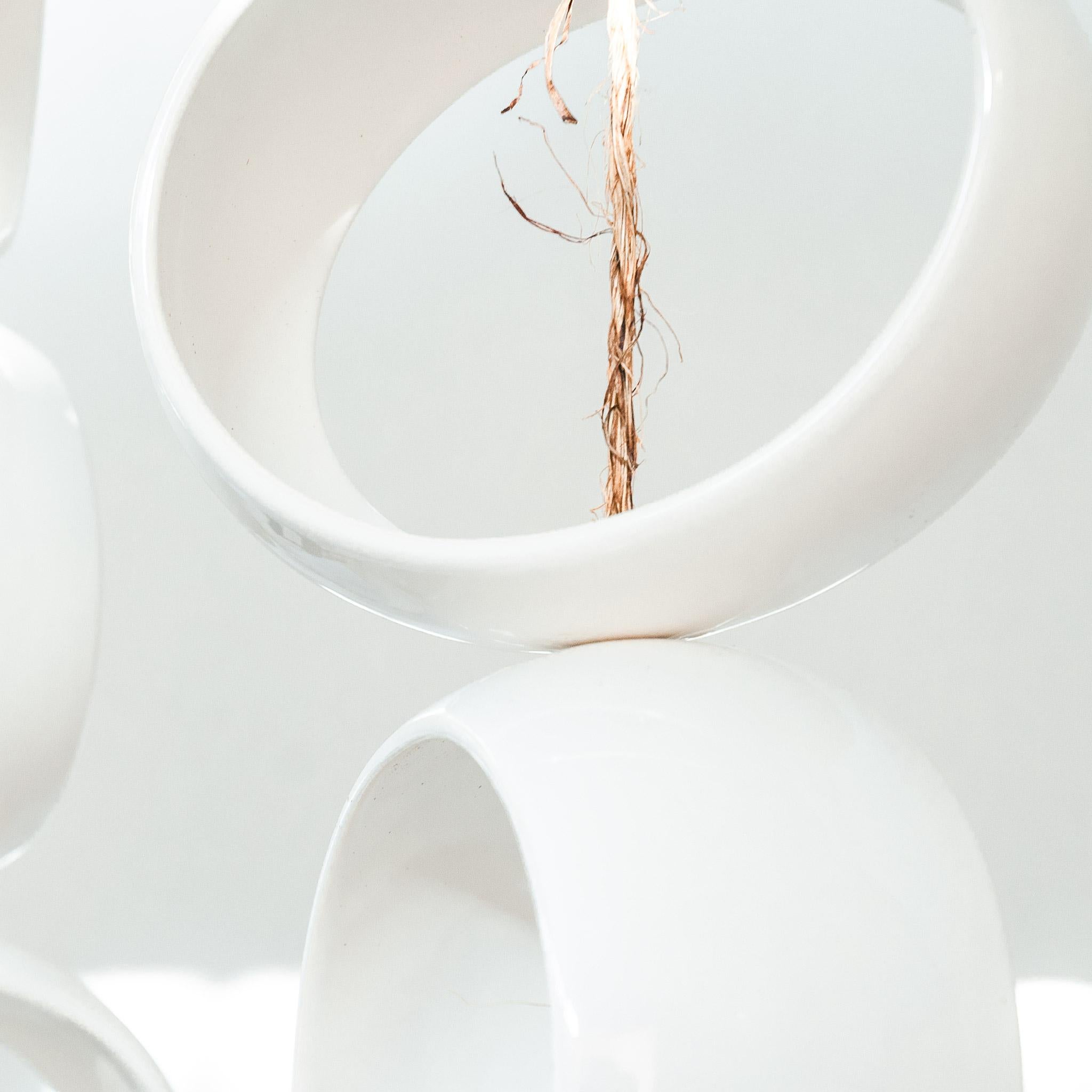 Escultura Orbe Blanco Hecho a mano en venta