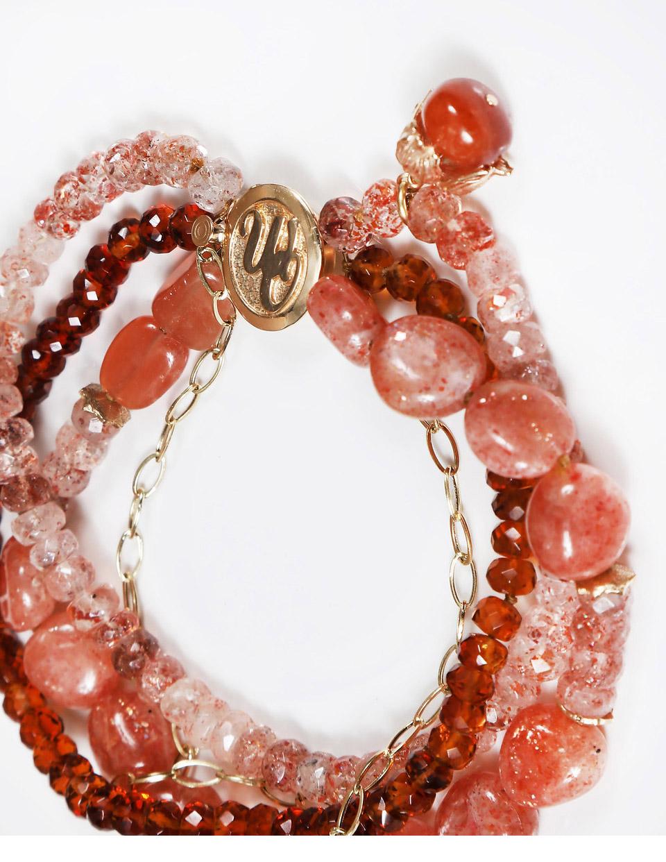 This multi-strand bracelet celebrates mandarin garnet, strawberry quartz, and polished sunstone. Chain encircles the bracelet and draws it together with a White Orchid Studio logo clasp.  All gold is 14kt yellow. 7.75