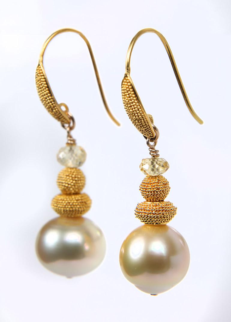 Faceted, golden-hued South Sea pearls (10mm) swing with untreated Songea sapphires and a glorious stack of granulated 18kt yellow gold earwires and rondelles.  