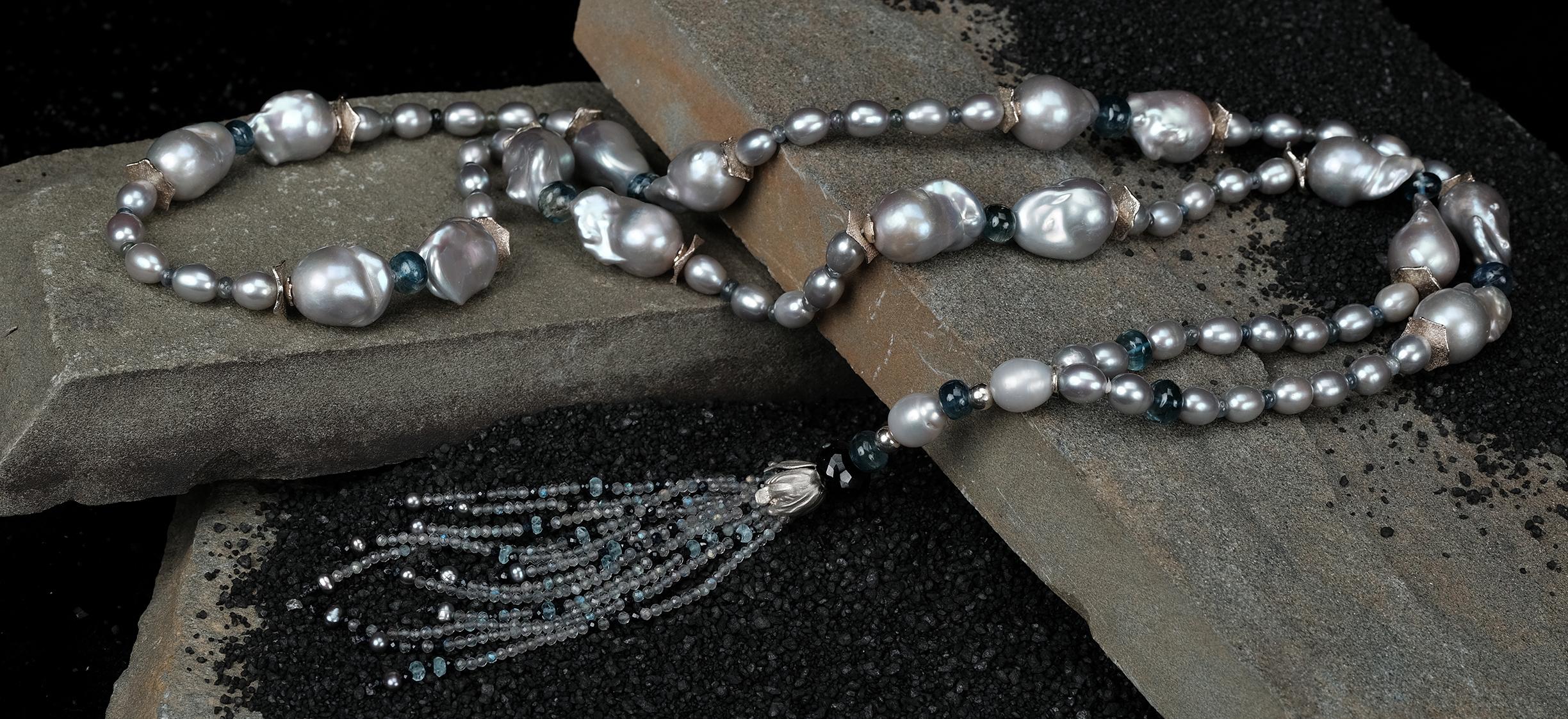 This pearl, kyanite, sapphire, topaz, and silver necklace-called a sautoir in French-continues a cherished tradition. Centuries ago sautoirs incorporated royal insignia into celebrations. Pearls were especially honored. Coco Chanel modernized the