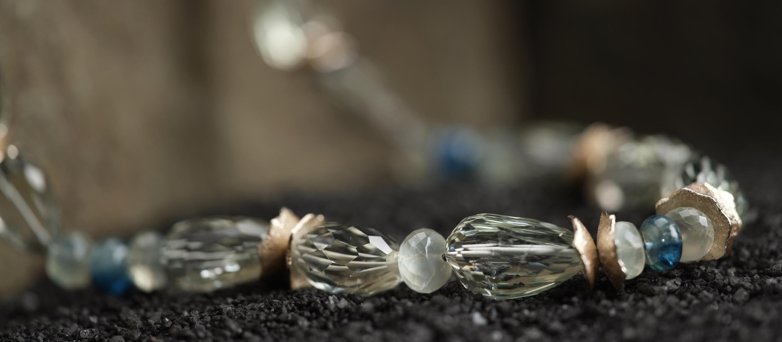Prasiolite nuggets reflect the beauty of blue-green kyanite and Ceylon moonstone. The quiet beauty of this princess necklace intensifies thanks to our spacers and vanilla bean clasp in sterling silver.  19
