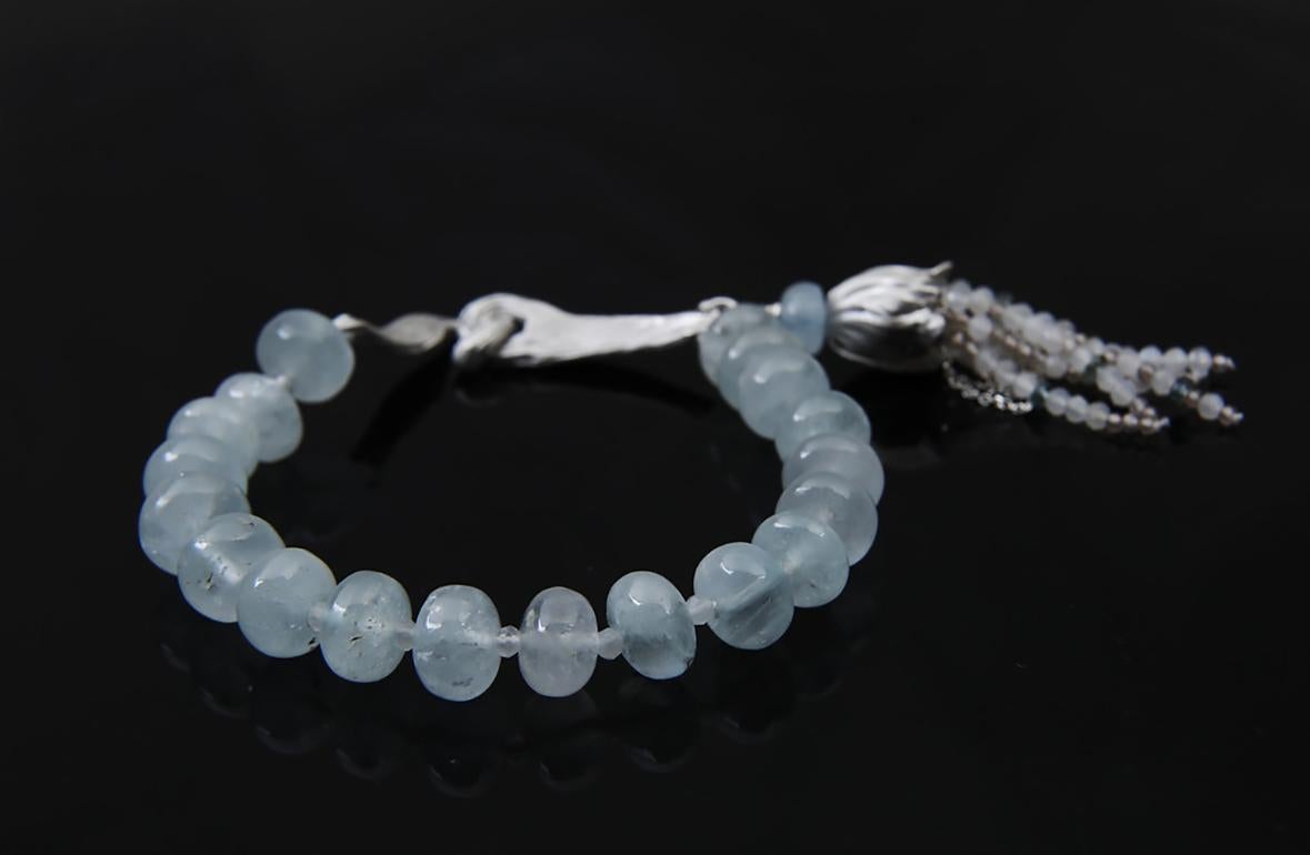 This aquamarine, moonstone, topaz, and silver bracelet projects a calm that welcomes expressions of compassion and gratitude.   

Wear 