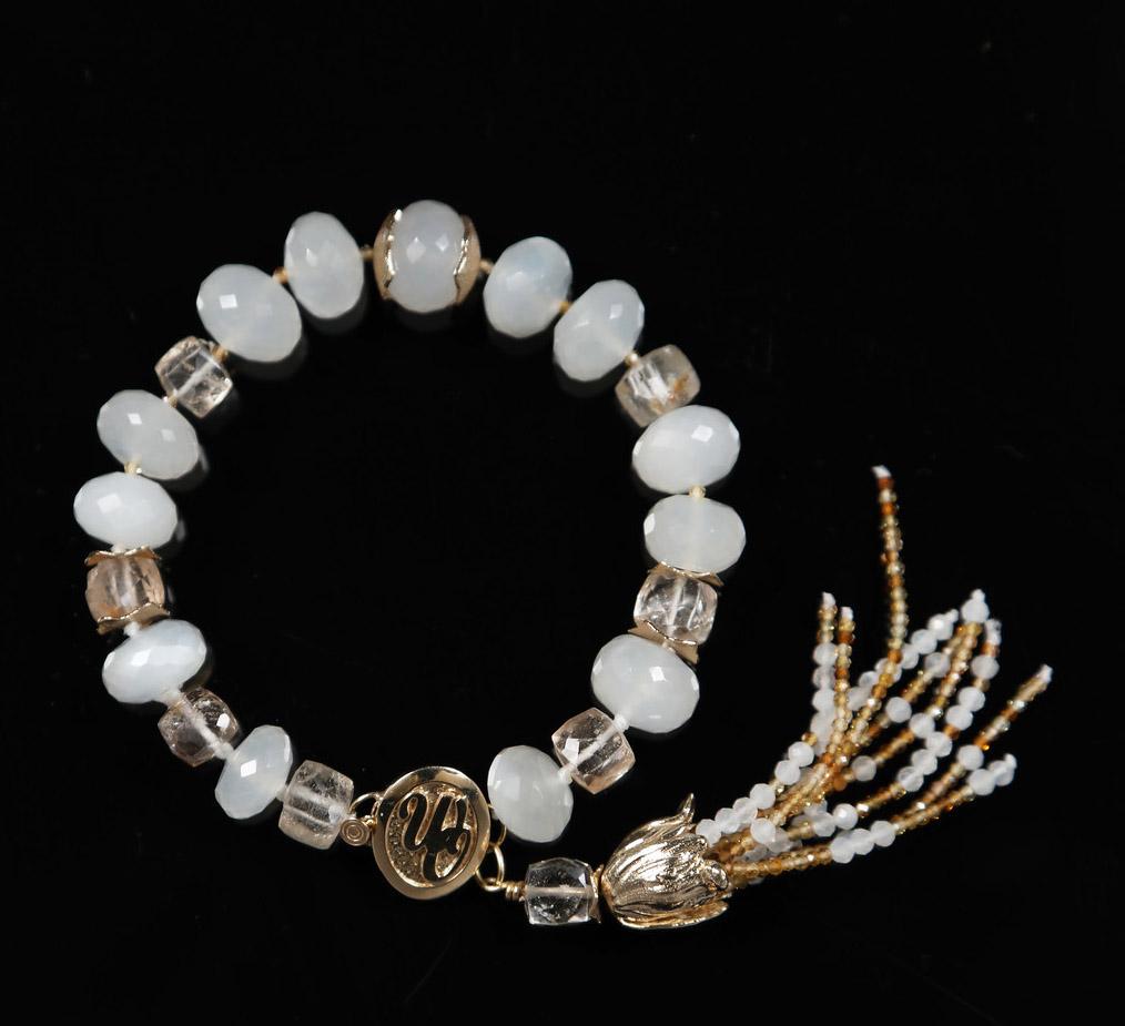 This moonstone, precious topaz, and gold bracelet is a seasonless bracelet for your permanent collection. Wear 