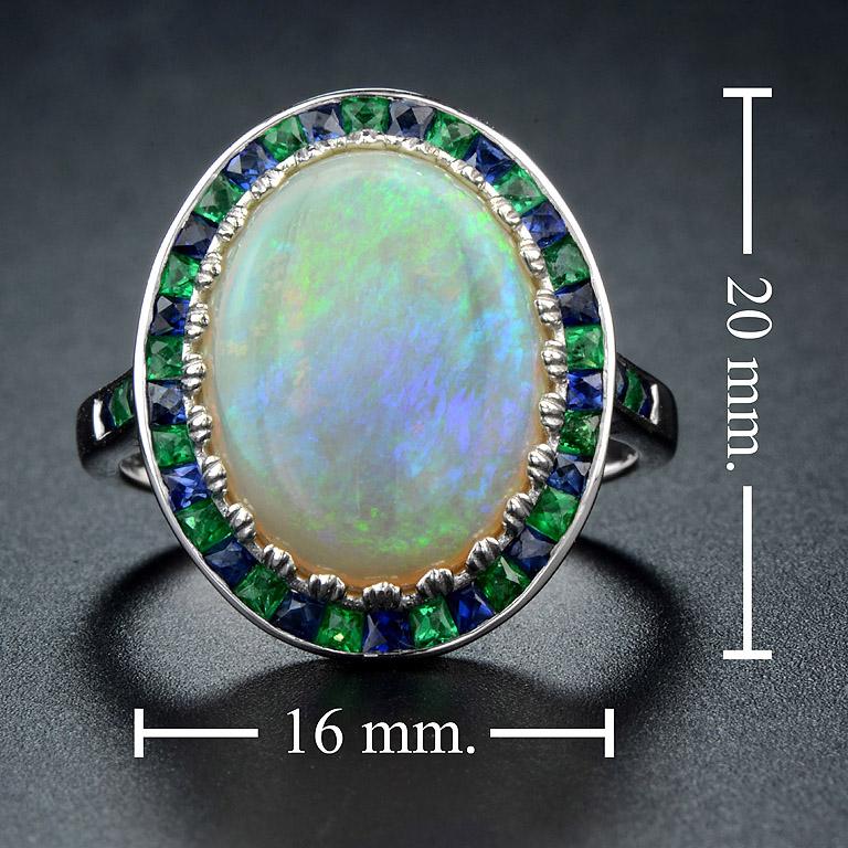 White Oval Cabochon Opal with Emerald & Sapphire Fancy Halo Set White Gold Ring For Sale 1