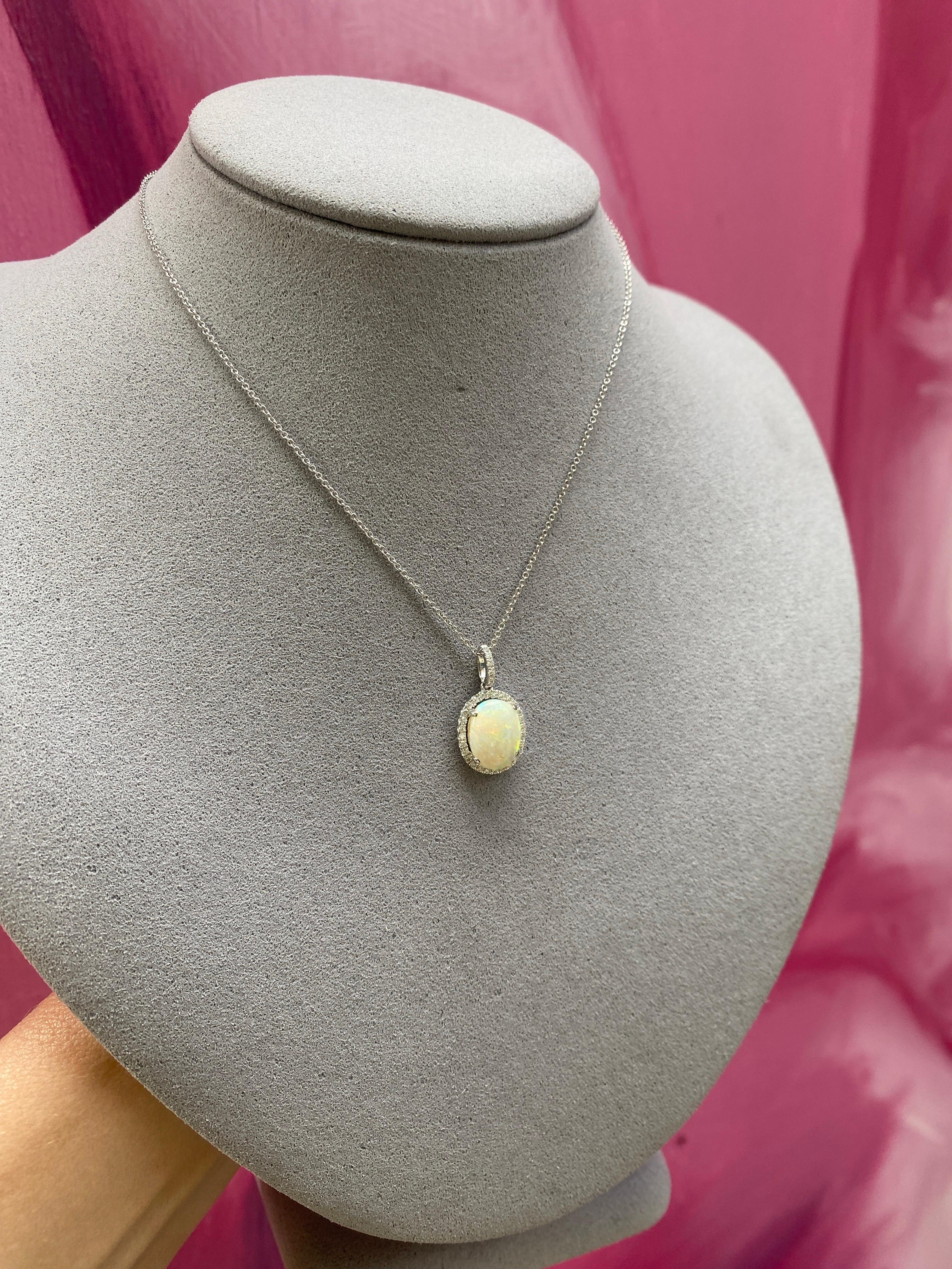 Oval Cut White Oval Opal and Diamond Halo Pendant 18 Karat White Gold Necklace For Sale