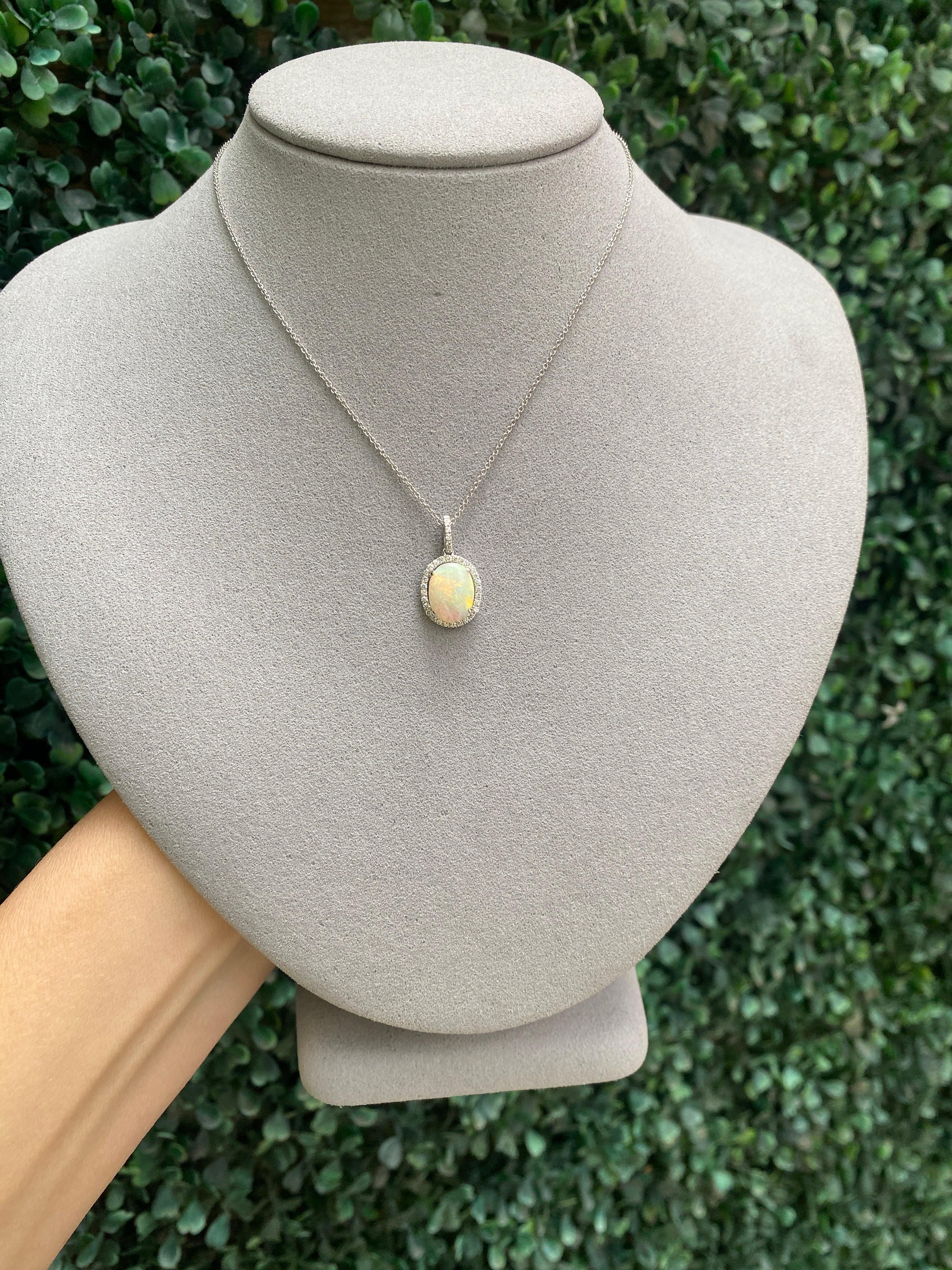 White Oval Opal and Diamond Halo Pendant 18 Karat White Gold Necklace For Sale 3