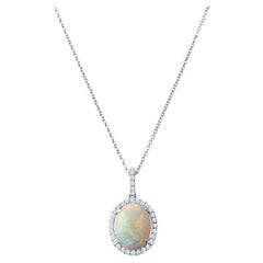White Oval Opal and Diamond Halo Pendant 18 Karat White Gold Necklace