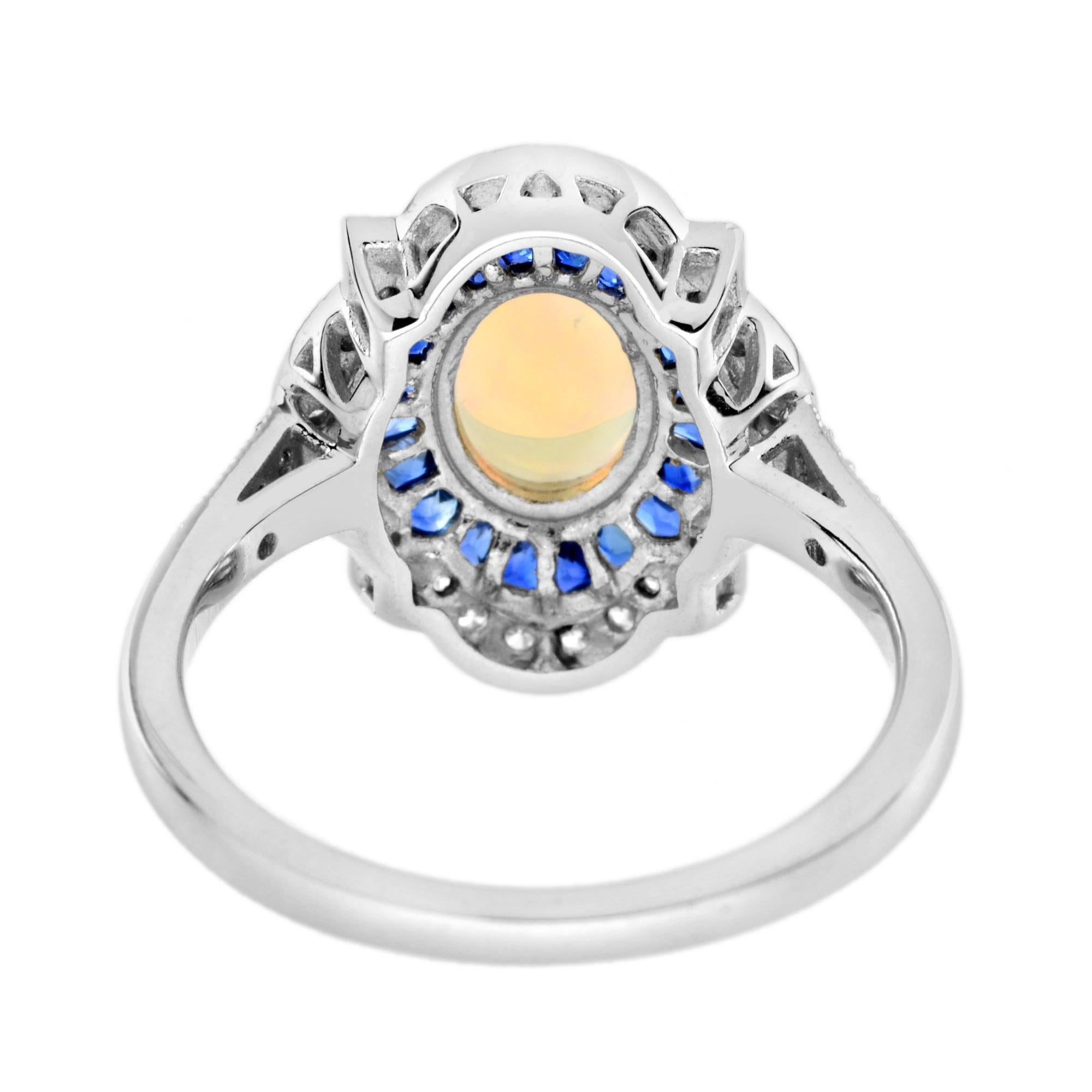 Cabochon Opale ovale bianco e zaffiro blu, diamante in stile Art Deco, anello a raggiera in oro bianco 14 carati in vendita