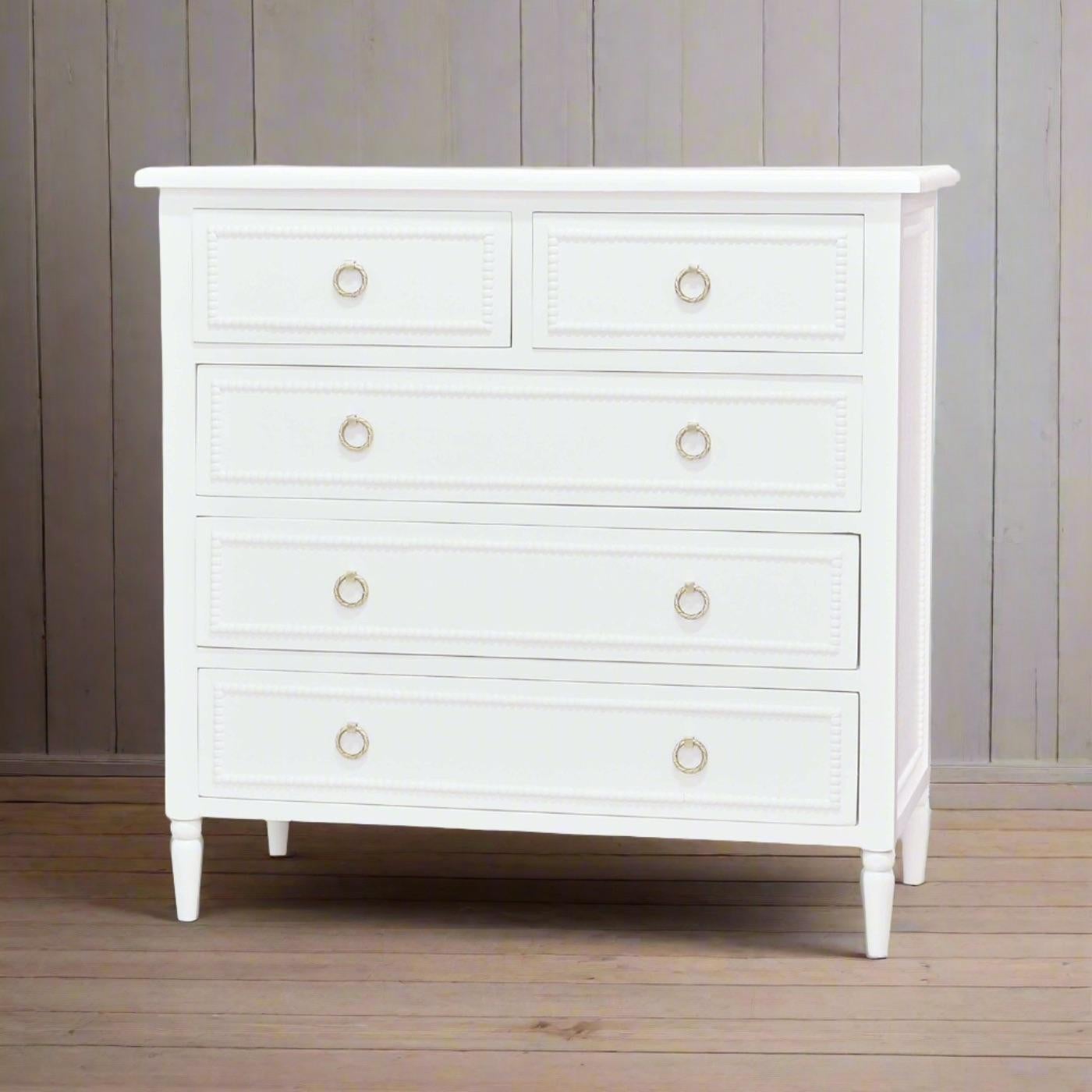 (A newly made reproduction) 

This beautifully crafted piece features a lightly distressed architectural white finish that complements any decor style. The delicate ring pulls add a hint of sophistication, making this chest a perfect addition to