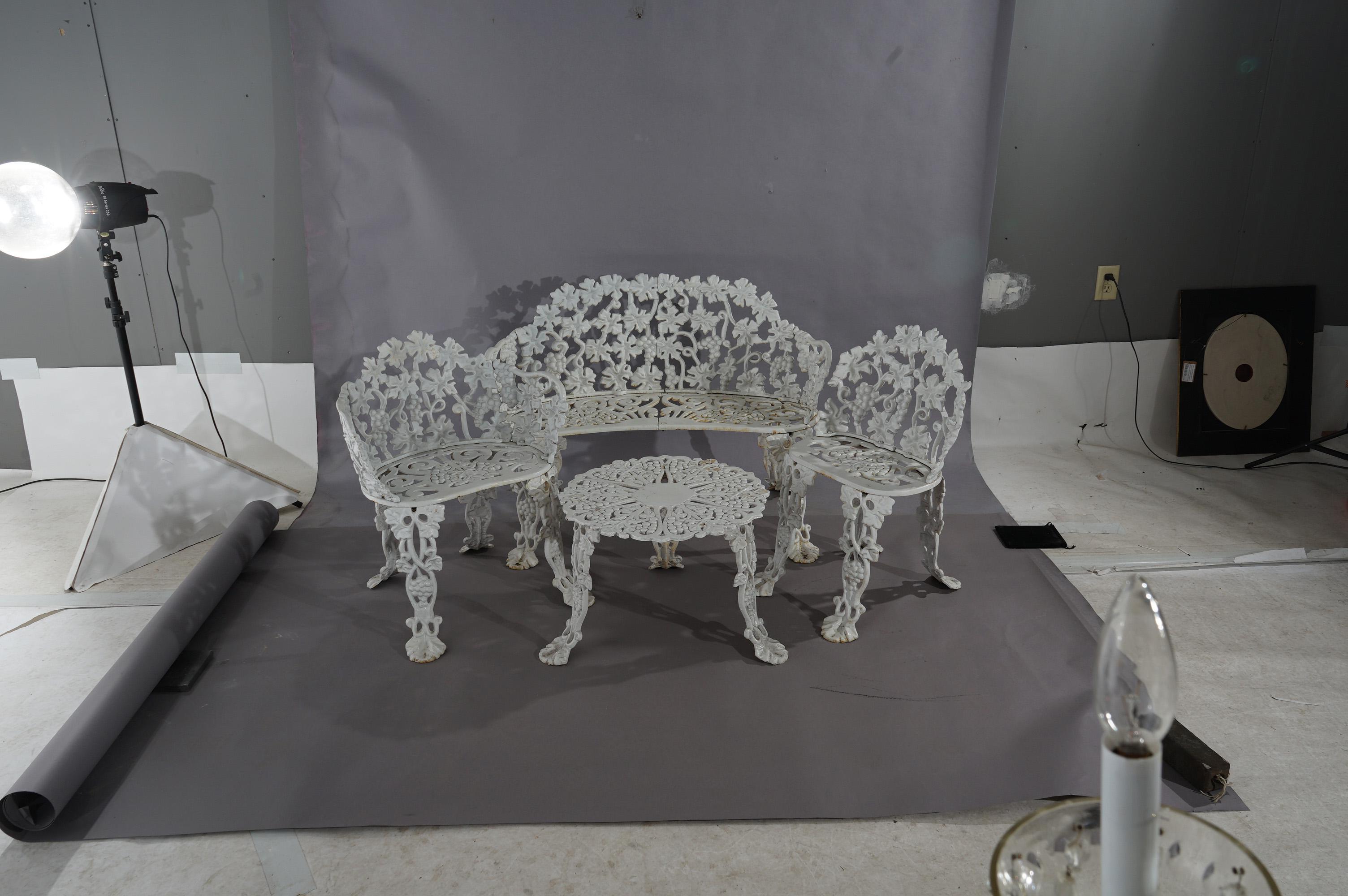 White Painted Cast Iron Grape & Leaf Four-Piece Garden Seating Set, 20thC In Good Condition In Big Flats, NY