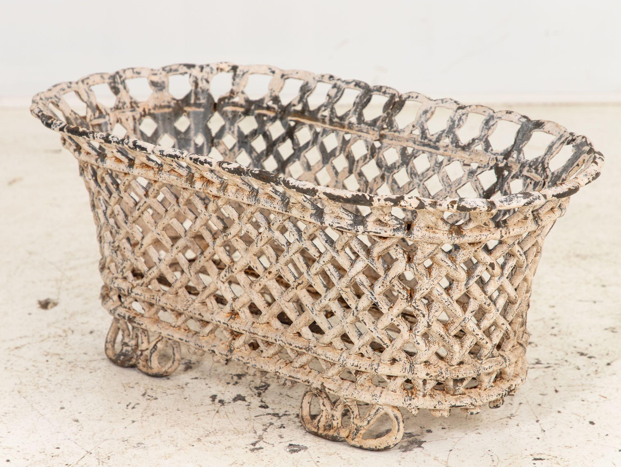 White Painted Cast Iron Latticework Basket, French early 20th C. In Good Condition For Sale In South Salem, NY