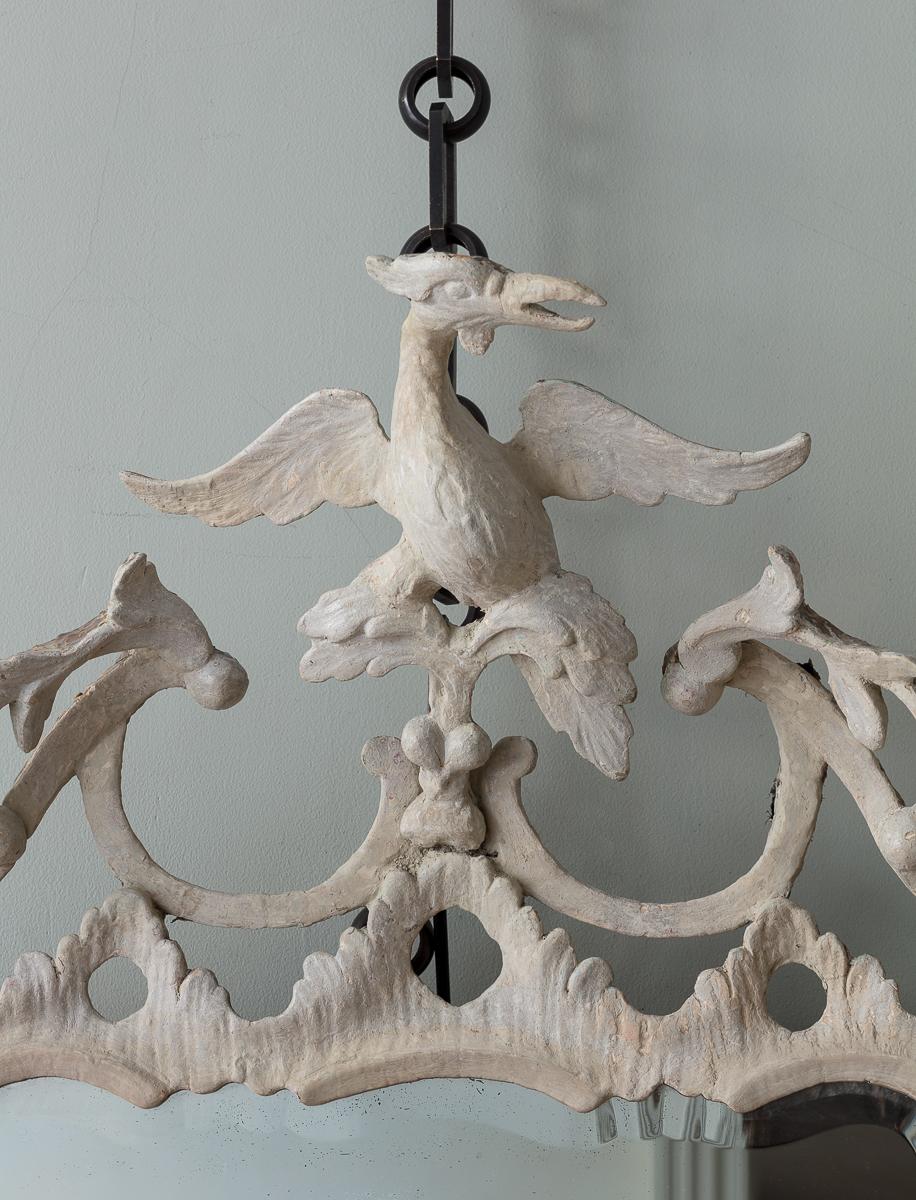 A Late 18th Century White Painted Chinese Chippendale Pier Mirror

The frame with ho-ho bird surmount over floral openwork and ‘C’ scrolls enclosing a conforming bevelled plate.

Additional information:
Dimensions: Height: 130cm, 51 1/4″
Width: