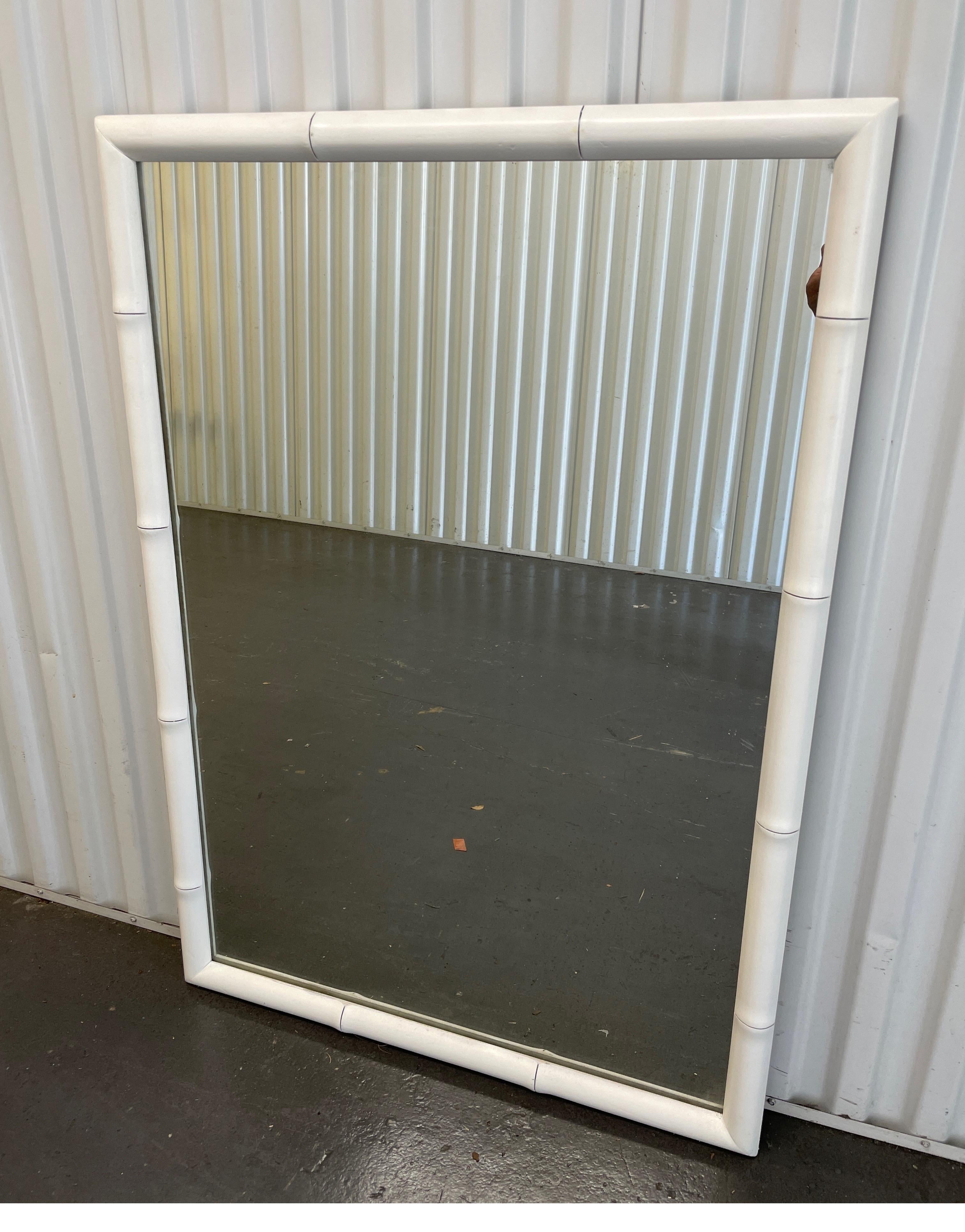 Mid century white painted faux bamboo wood mirror.