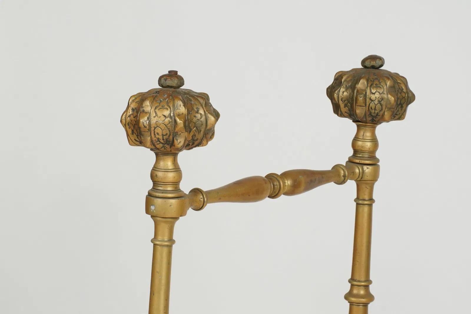 Neoclassical 19th century Italian curule or Savonarola chair, white-painted wrought iron frame with turned brass accents